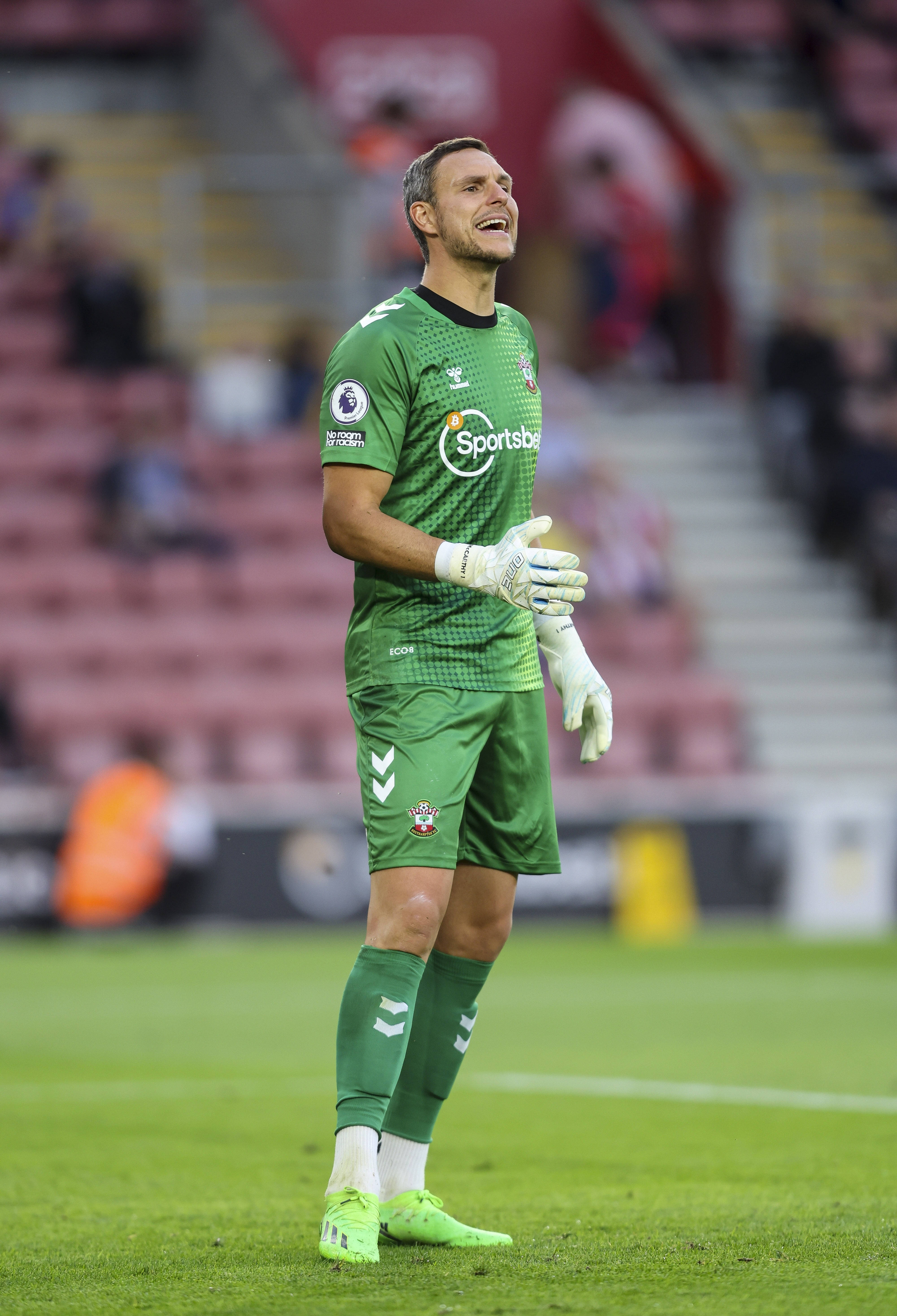 Alex McCarthy På En Fotballstadion Bakgrunner
