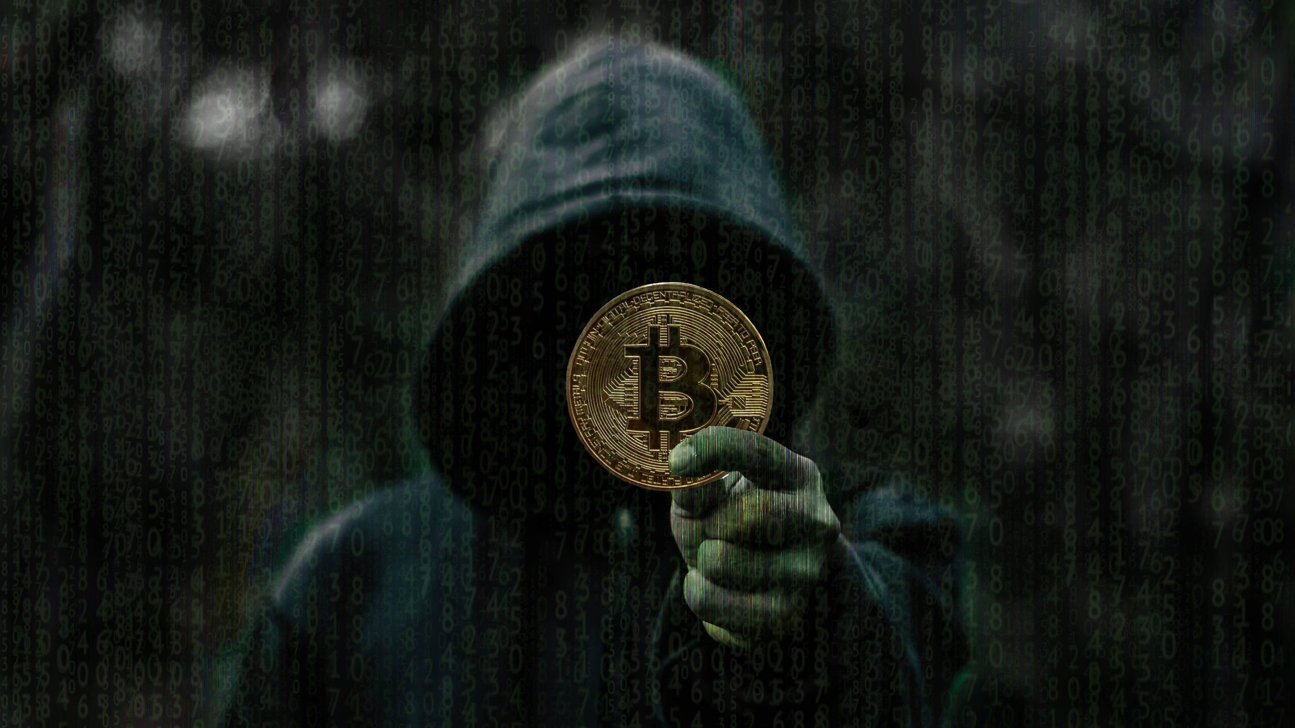 Anonym mann med Bitcoin-kryptobakgrunn Bakgrunner