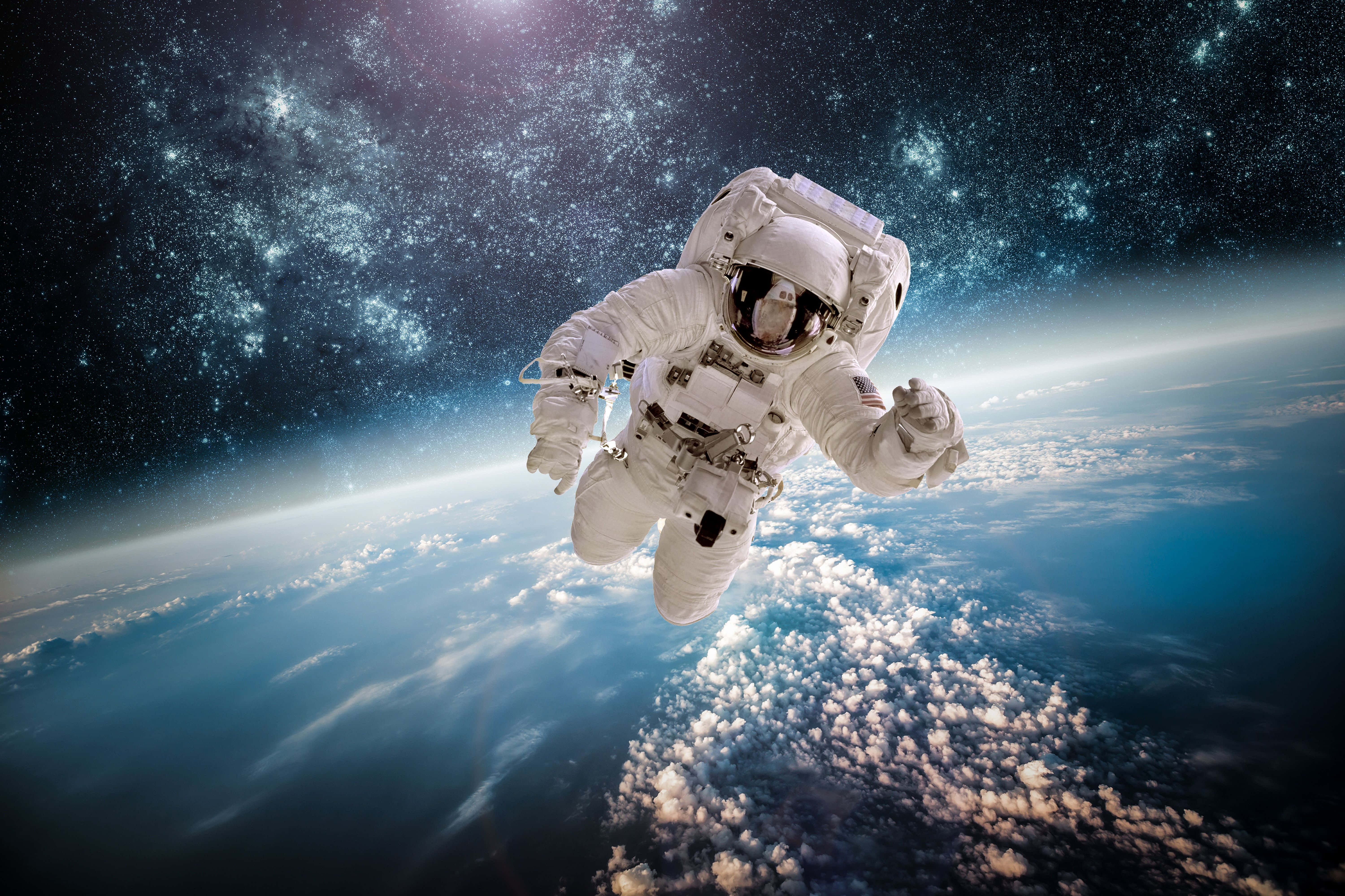 Astronaut i galakser skrivebord Bakgrunner