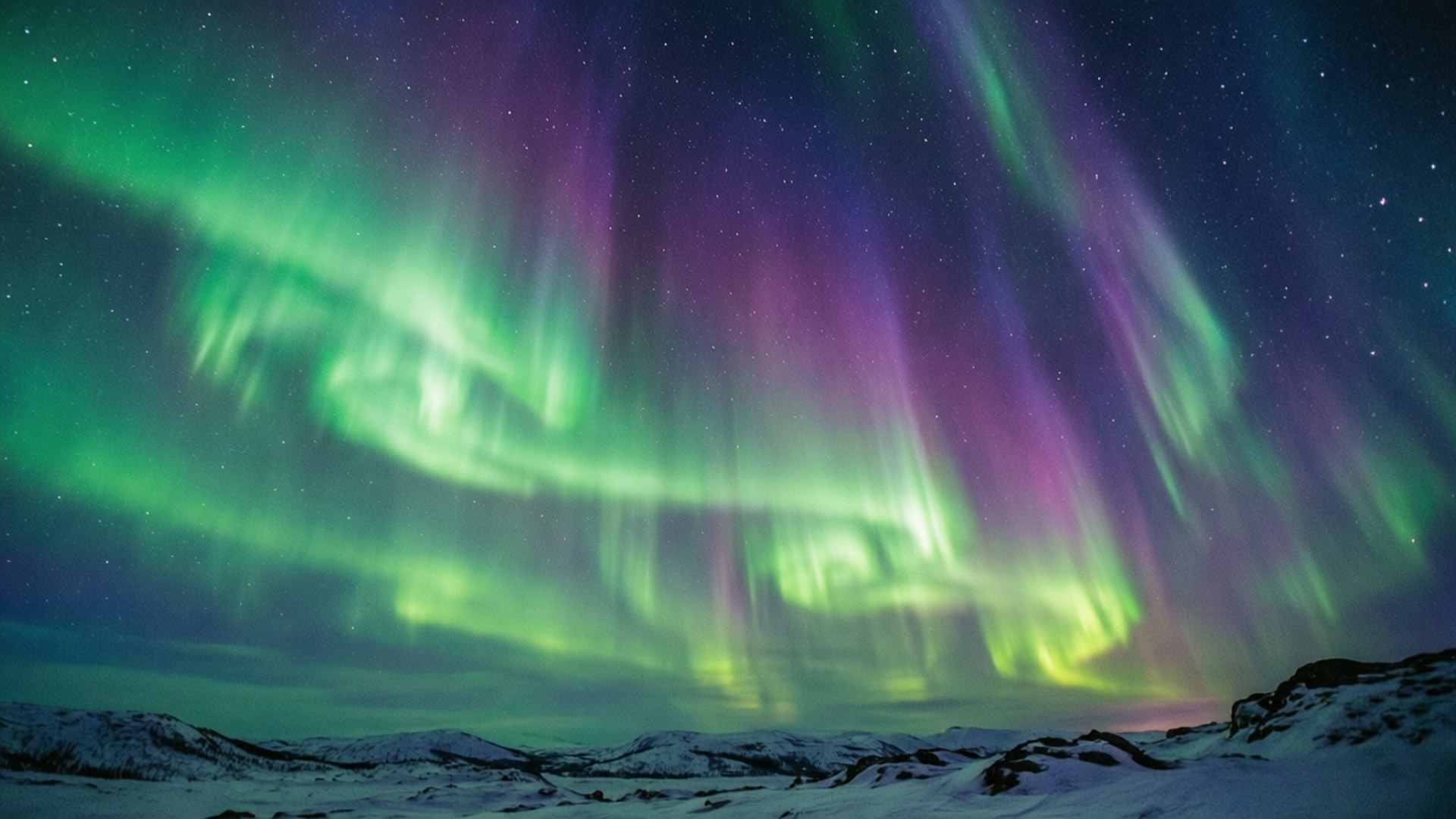 Aurora over snø Bakgrunner