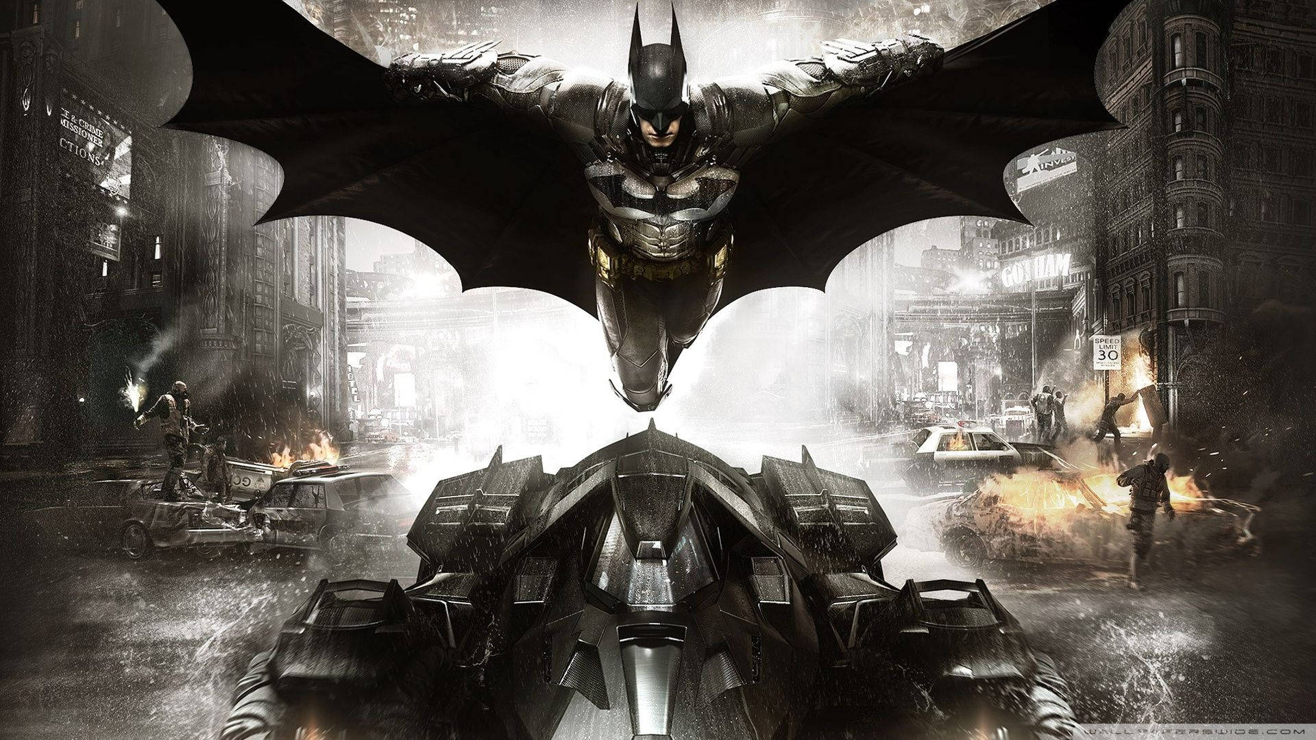 Batman flyr over Batmobile Bakgrunner