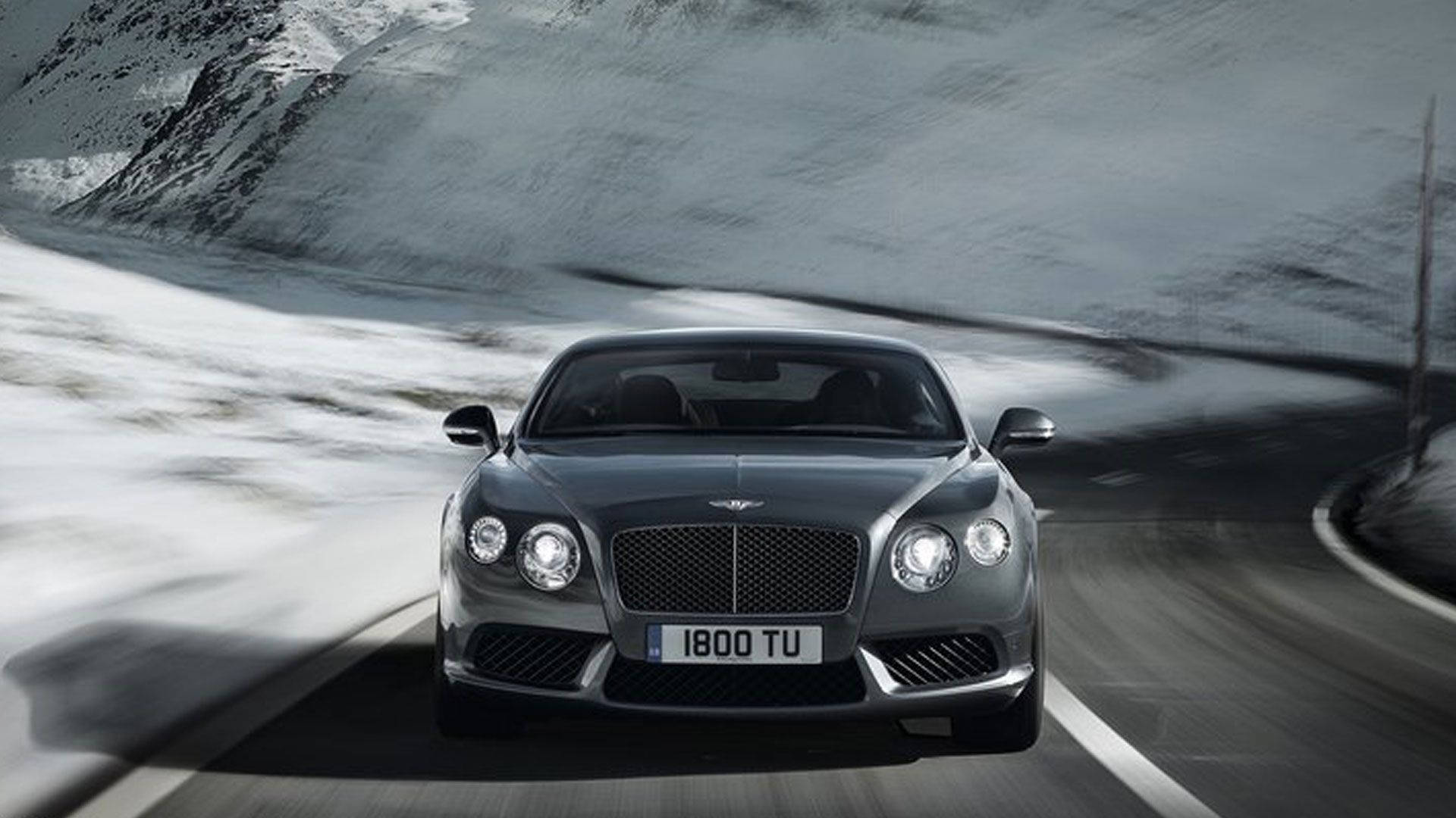 Bentley suser i snødekte fjell Bakgrunner
