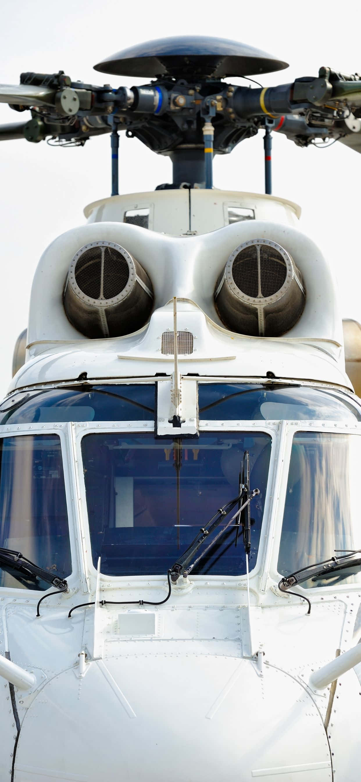 Bilde Fargerike Helikoptre mot en iPhone XS Max Blå Himmel Bakgrunn Bakgrunner