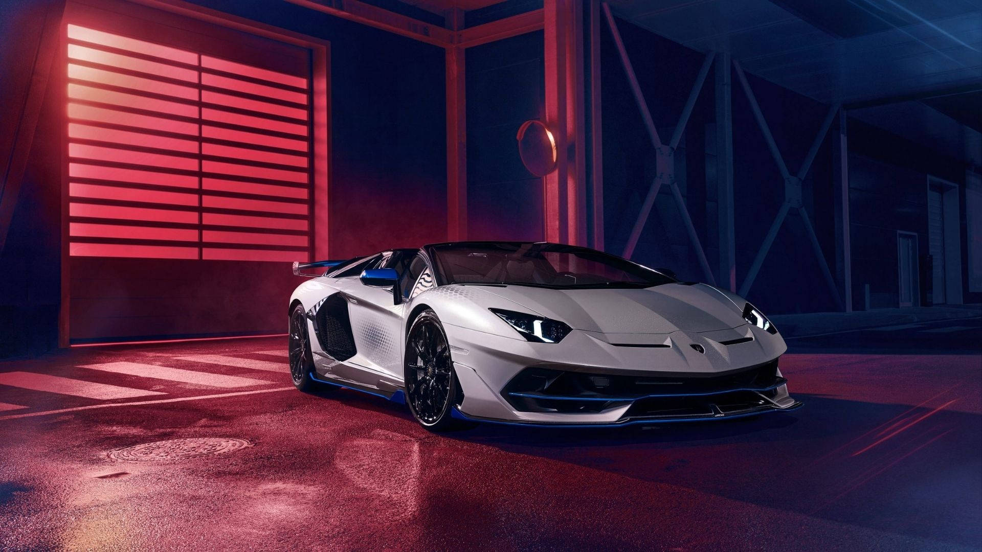 Bildetekst: En imponerende Lamborghini Aventador SVJ Xago i midnattsblått Bakgrunner