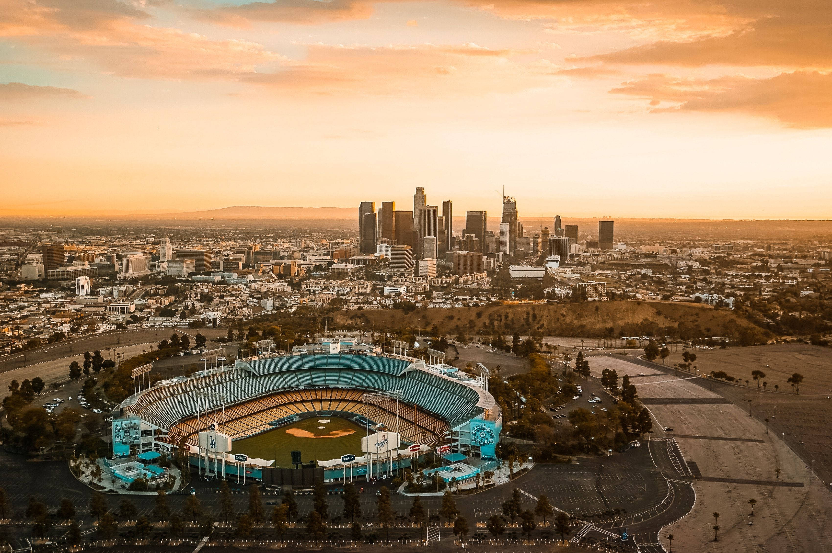 Blek oransje Los Angeles solnedgang Bakgrunner