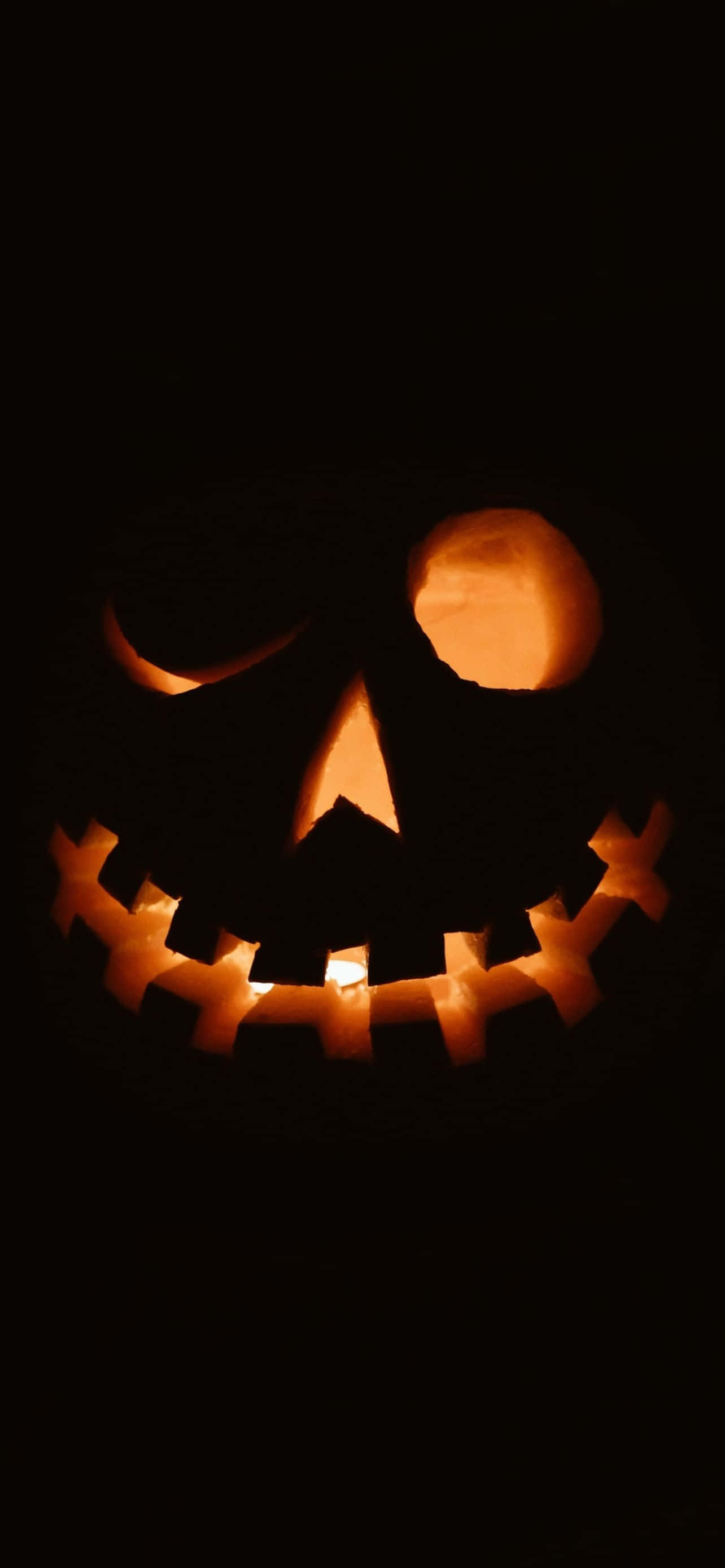 Bli festlig denne halloween med en tilpasset bakgrunn på iPhone Bakgrunner