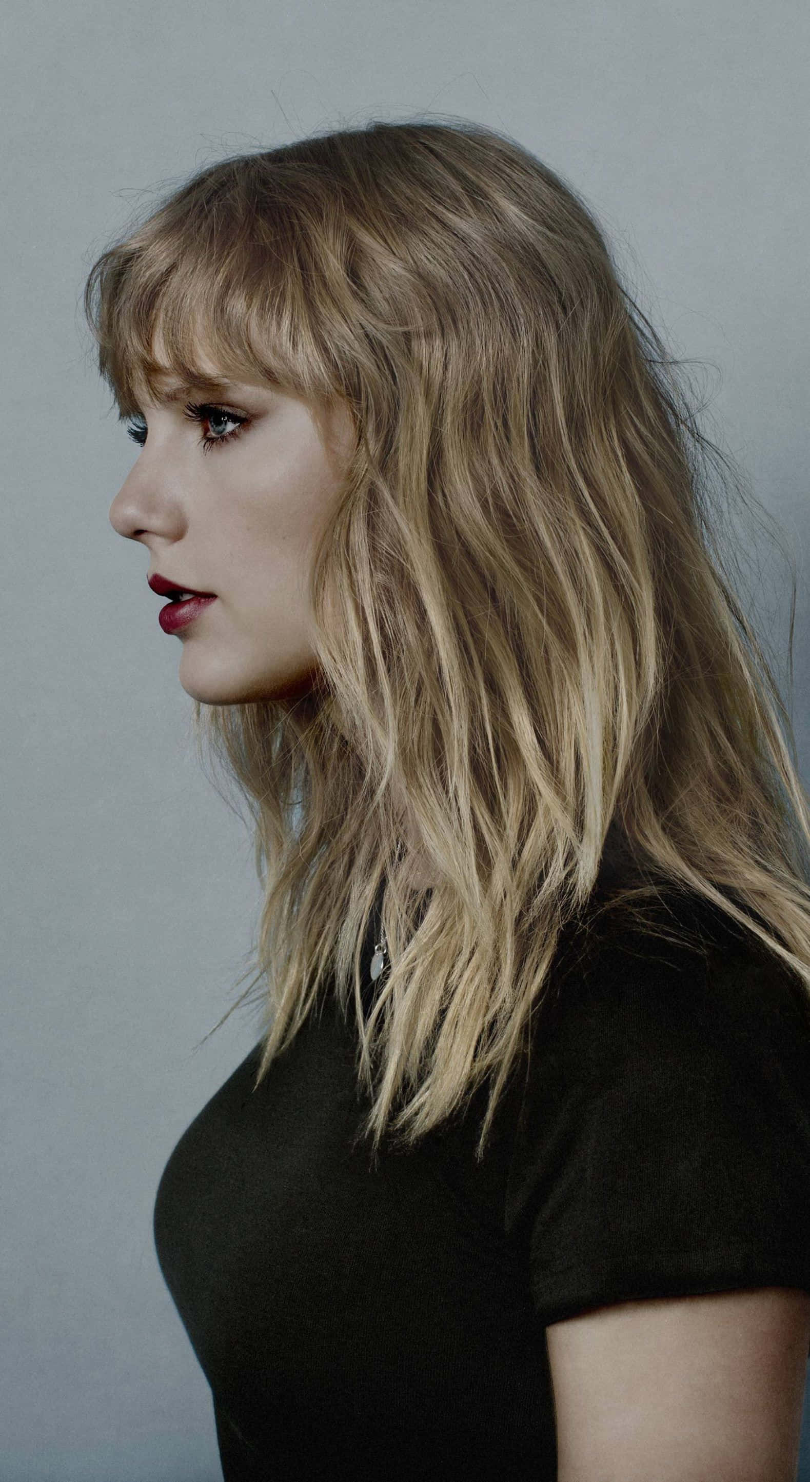 Blond Taylor Swift iPhone Bakgrunner