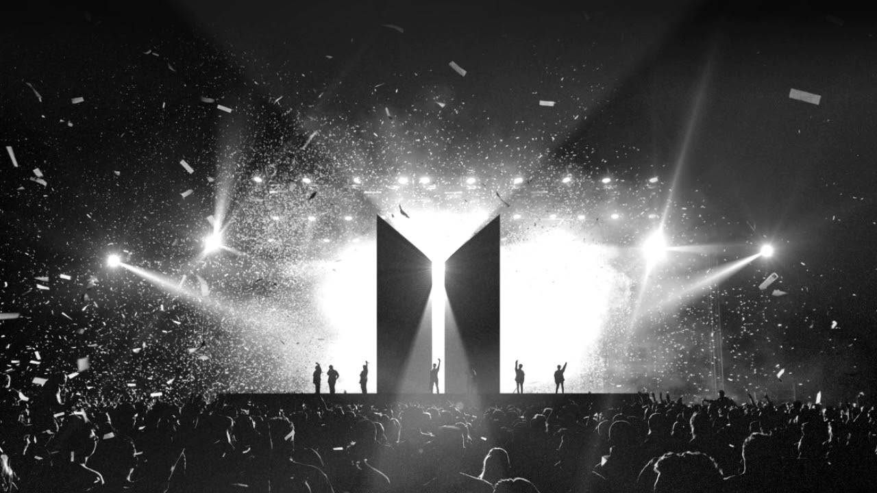 BTS-konsert med BTS-logo som silhuett Bakgrunner