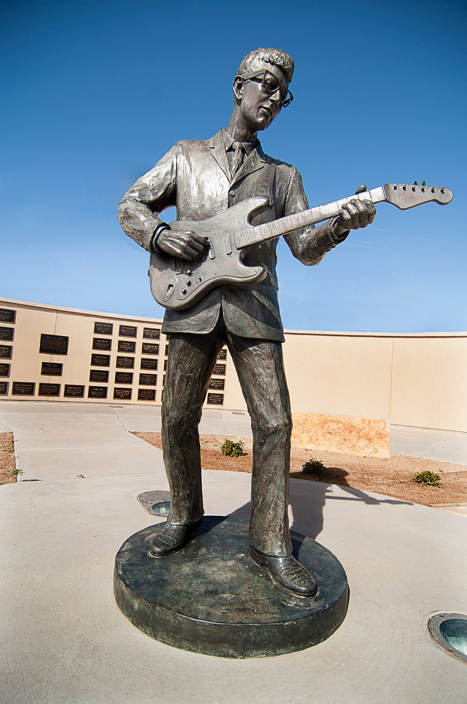 Buddy Holly And The Crickets-statuen Bakgrunner
