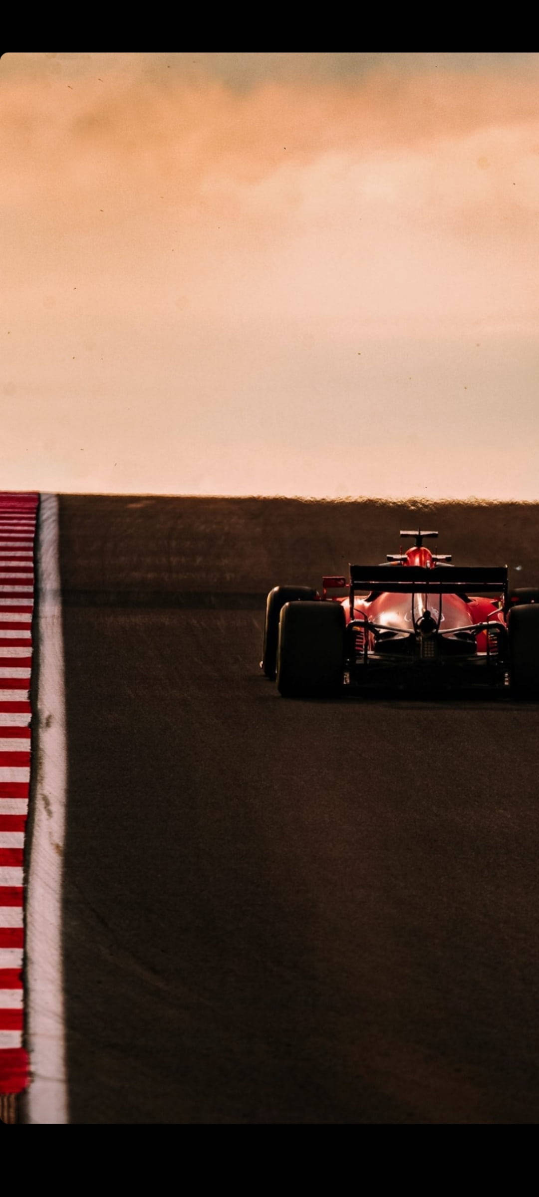 Charles Leclerc kjører inn i solnedgangen Bakgrunner