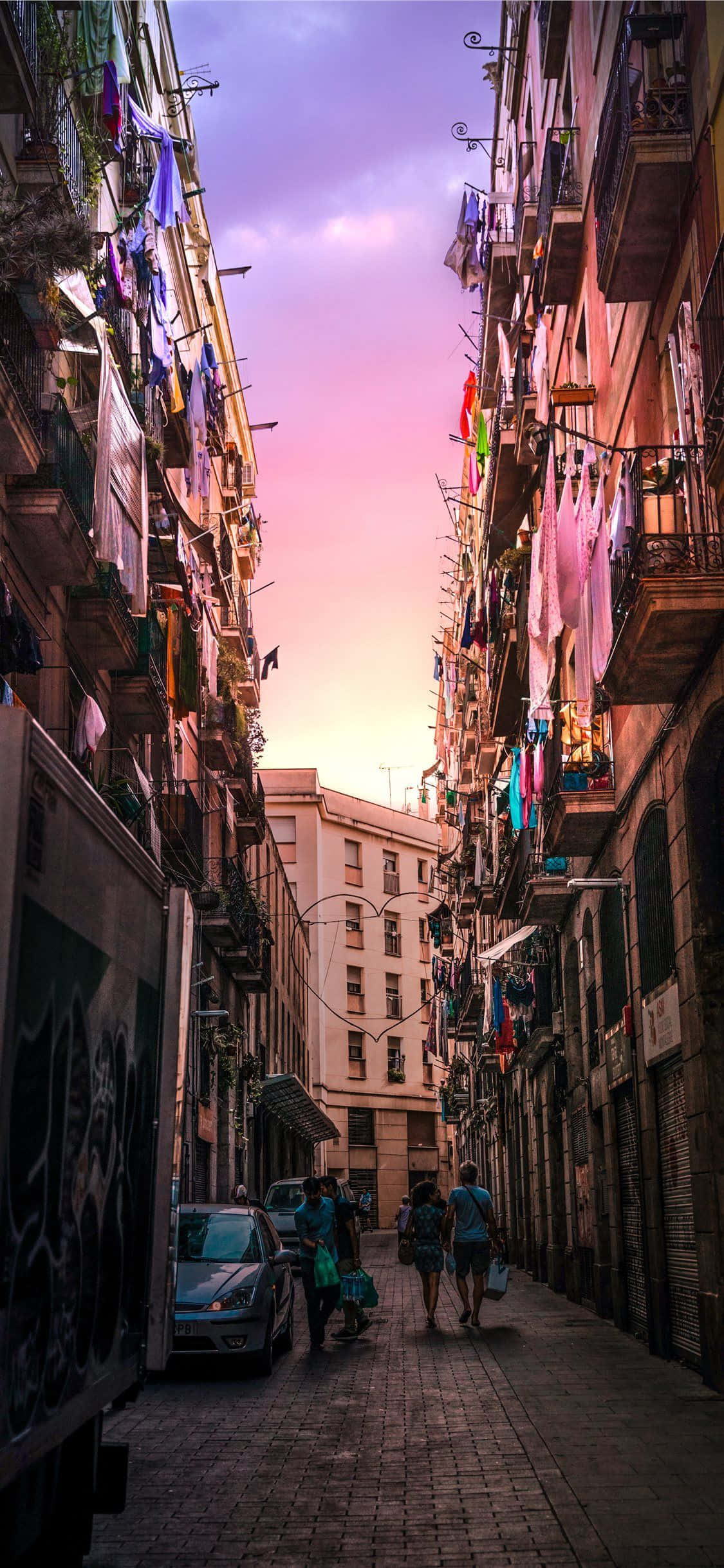 Den pulserende strandpromenaden i Barcelona, Spania Bakgrunner