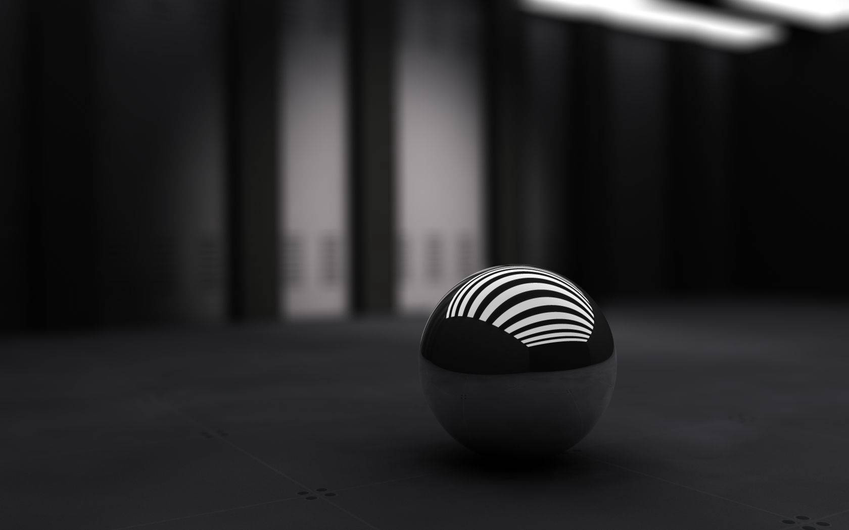 3D skrivebordsbakgrunn av liten svart sfære. — Skrivebords-GIF Bakgrunner