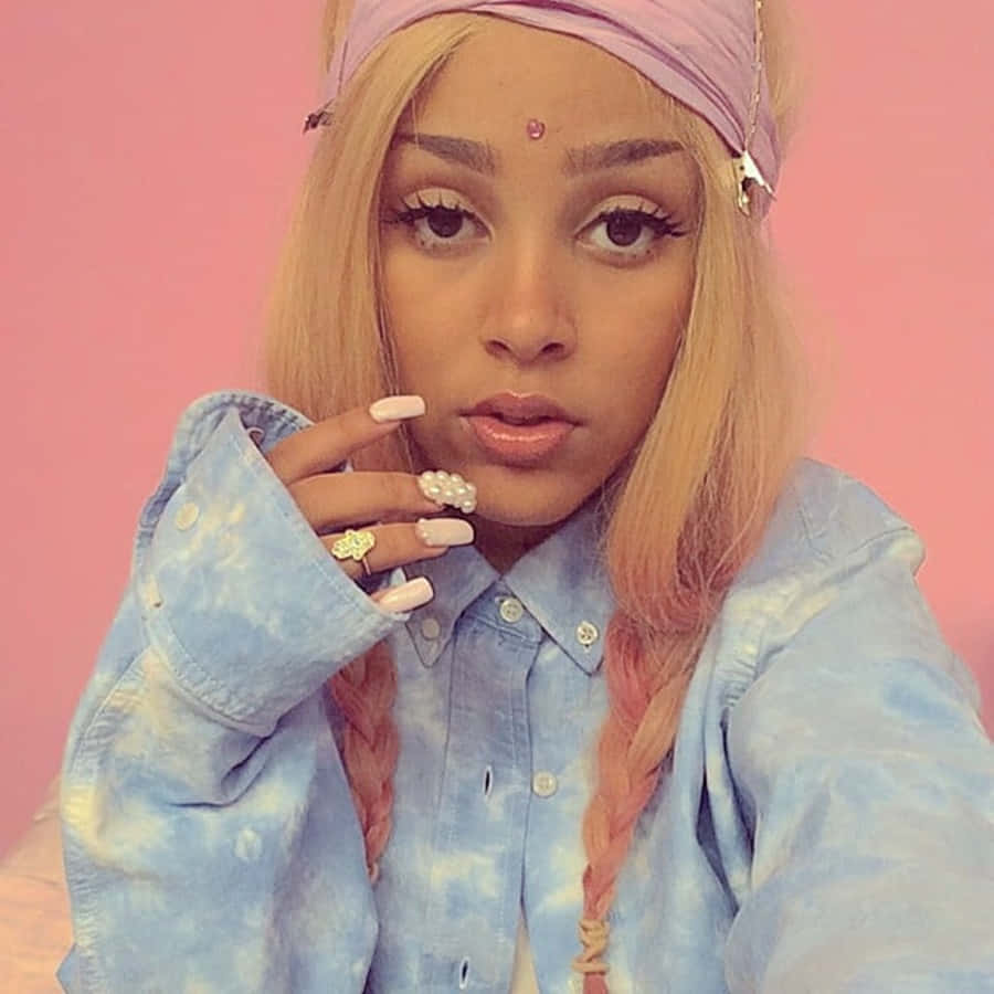 Doja Cat med sine signaturfargerike fletter Bakgrunner