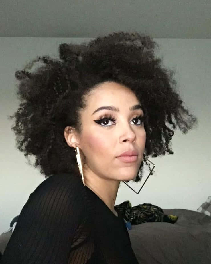 Doja Cat som utstråler positivitet og stil Bakgrunner
