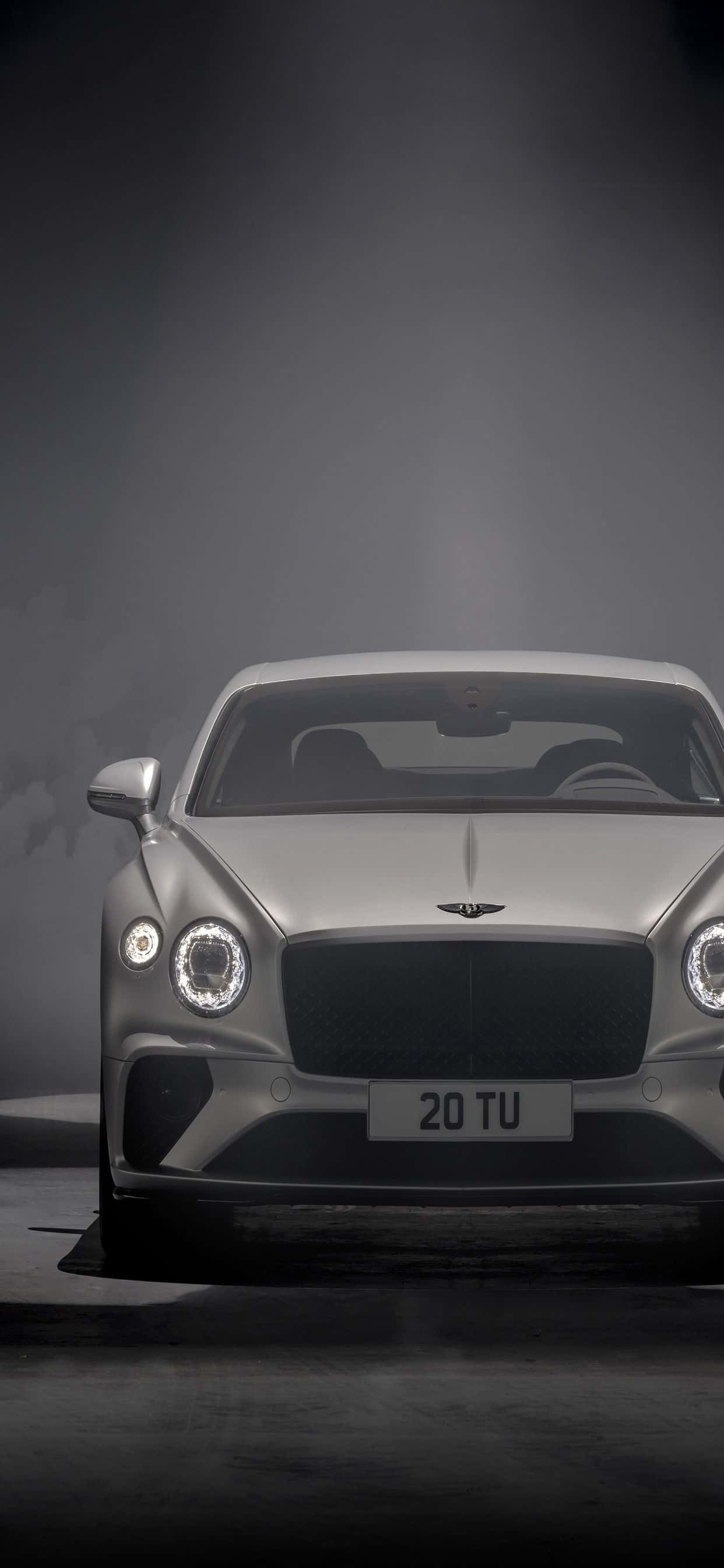 Dykke inn i luksus: En iPhone Xs Max i en Bentley Bakgrunner
