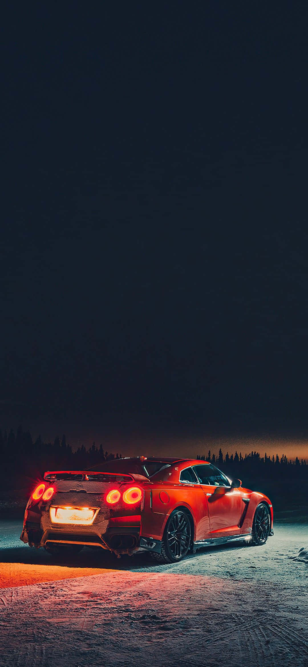 Dynamisk Nissan R35 GTR som viser kraft og stil Bakgrunner