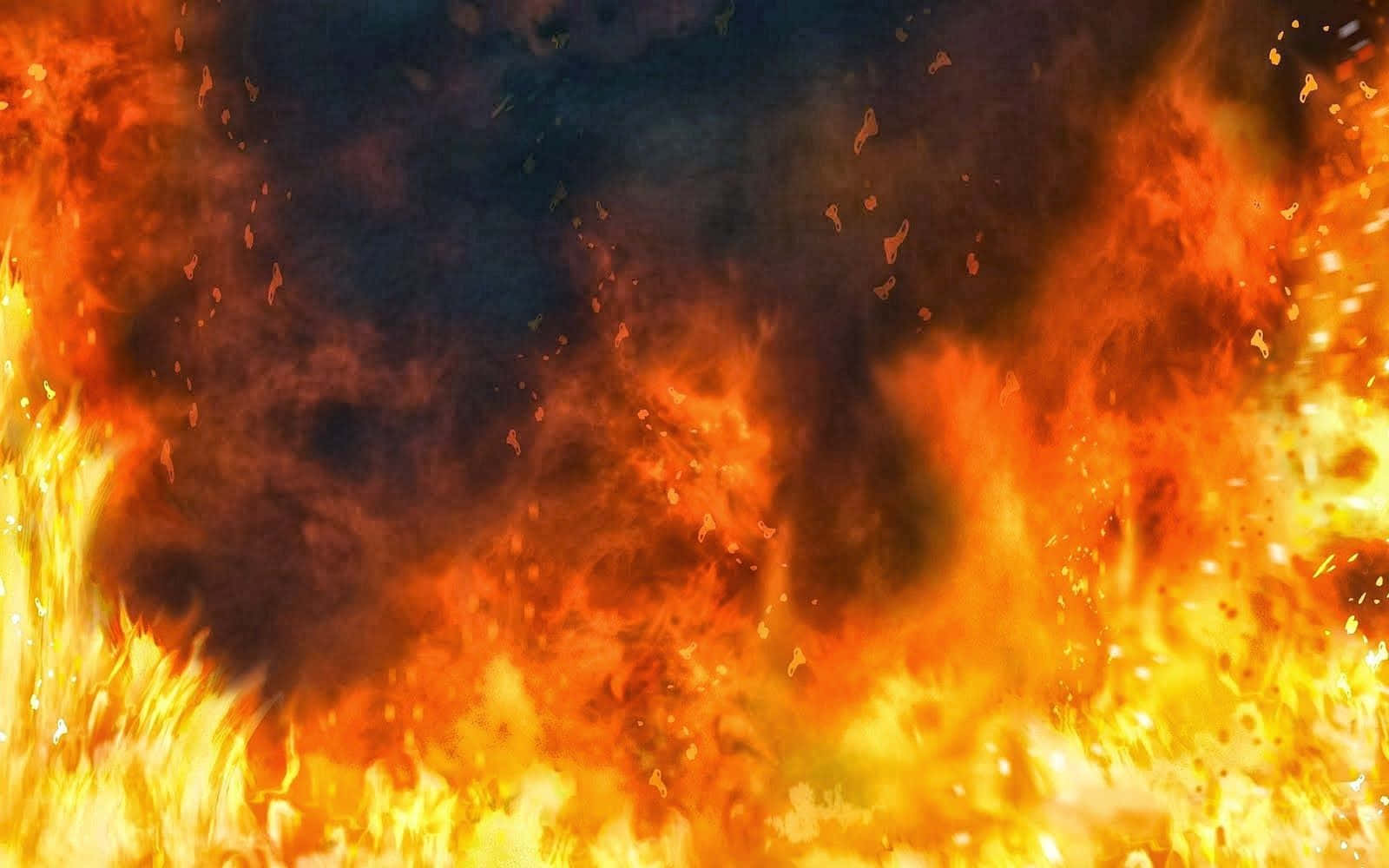 en ild med flammer på svart bakgrunn Bakgrunner