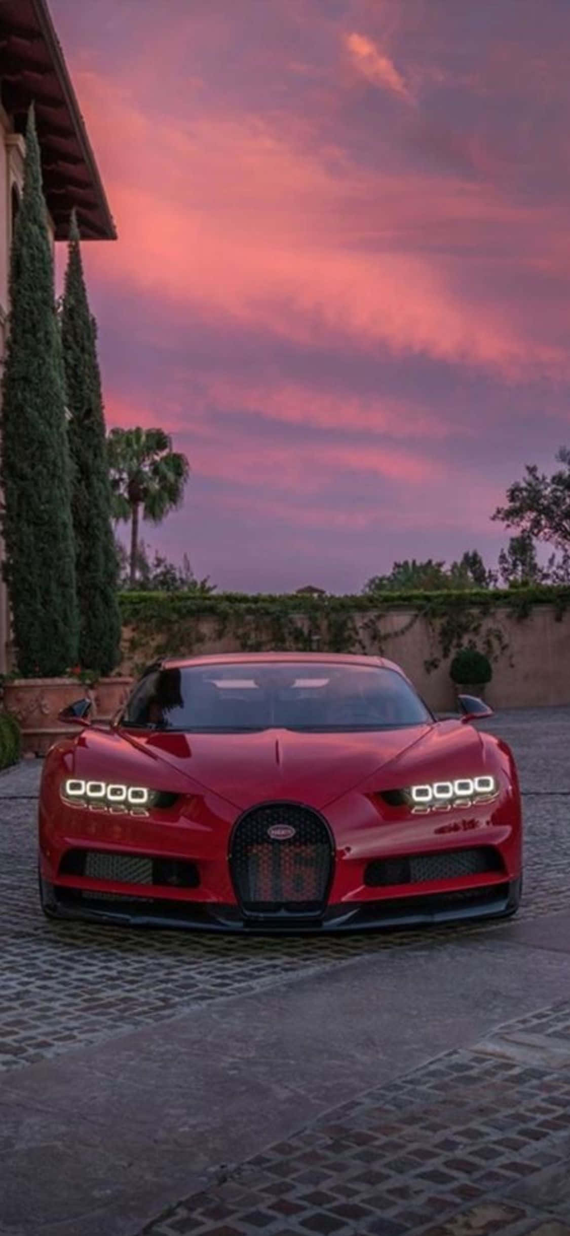 En iPhone Xs med en luksuriøs Bugatti-bakgrunn Bakgrunner