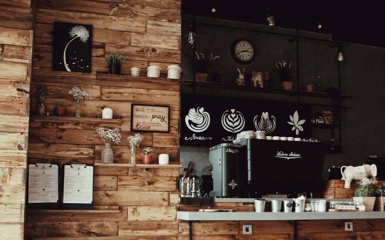 en kaffebar med trevegger og en trebenk Bakgrunner
