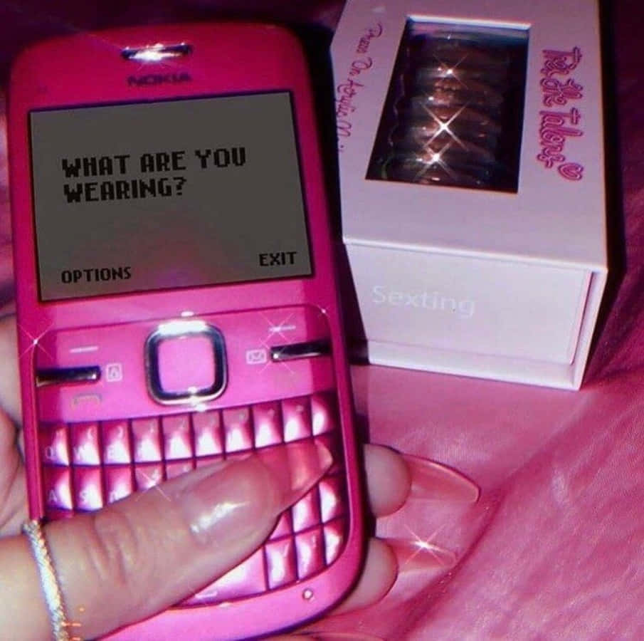 en rosa mobiltelefon med en melding på Bakgrunner