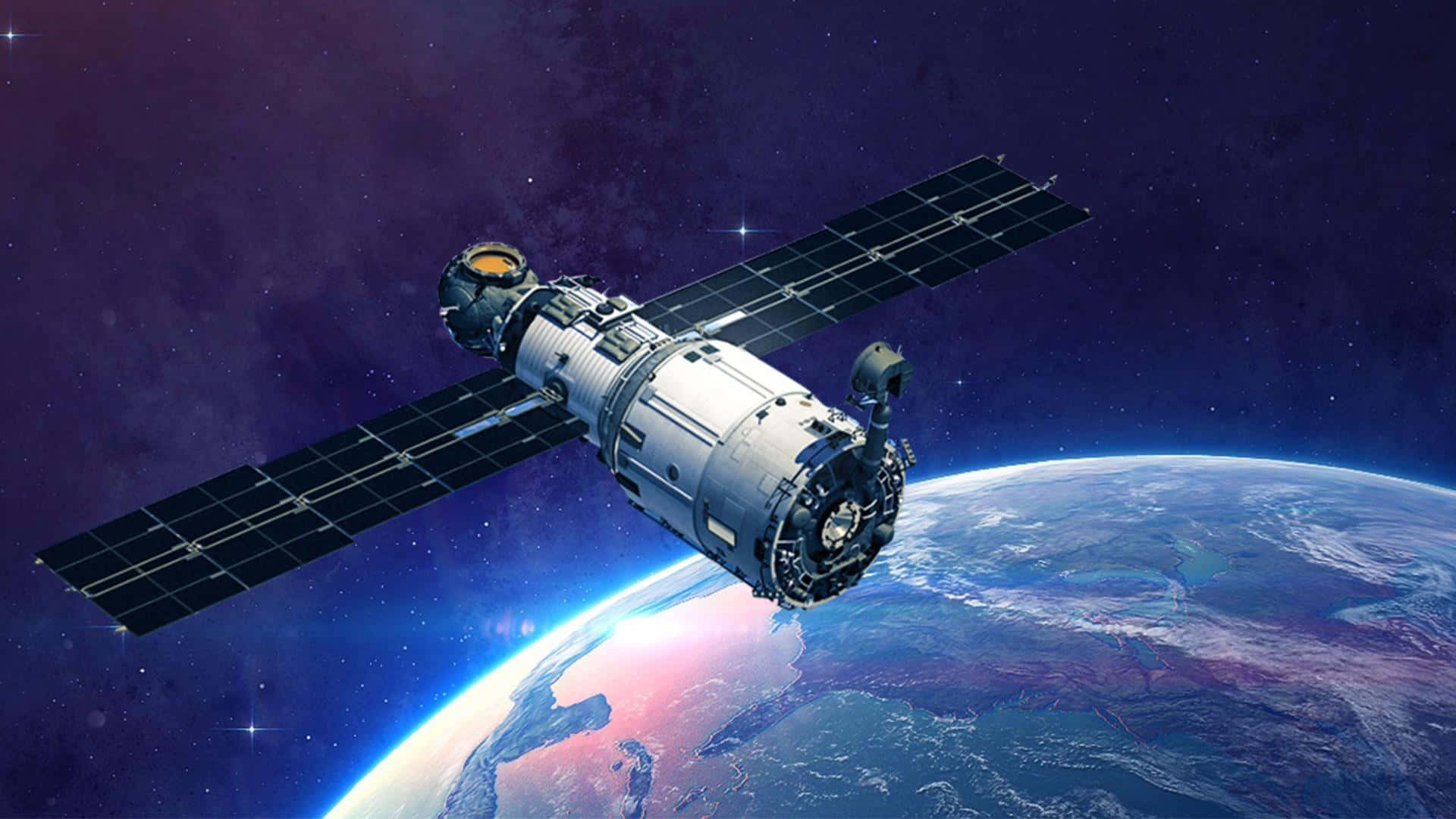 en satellitt flyr over jorden Bakgrunner