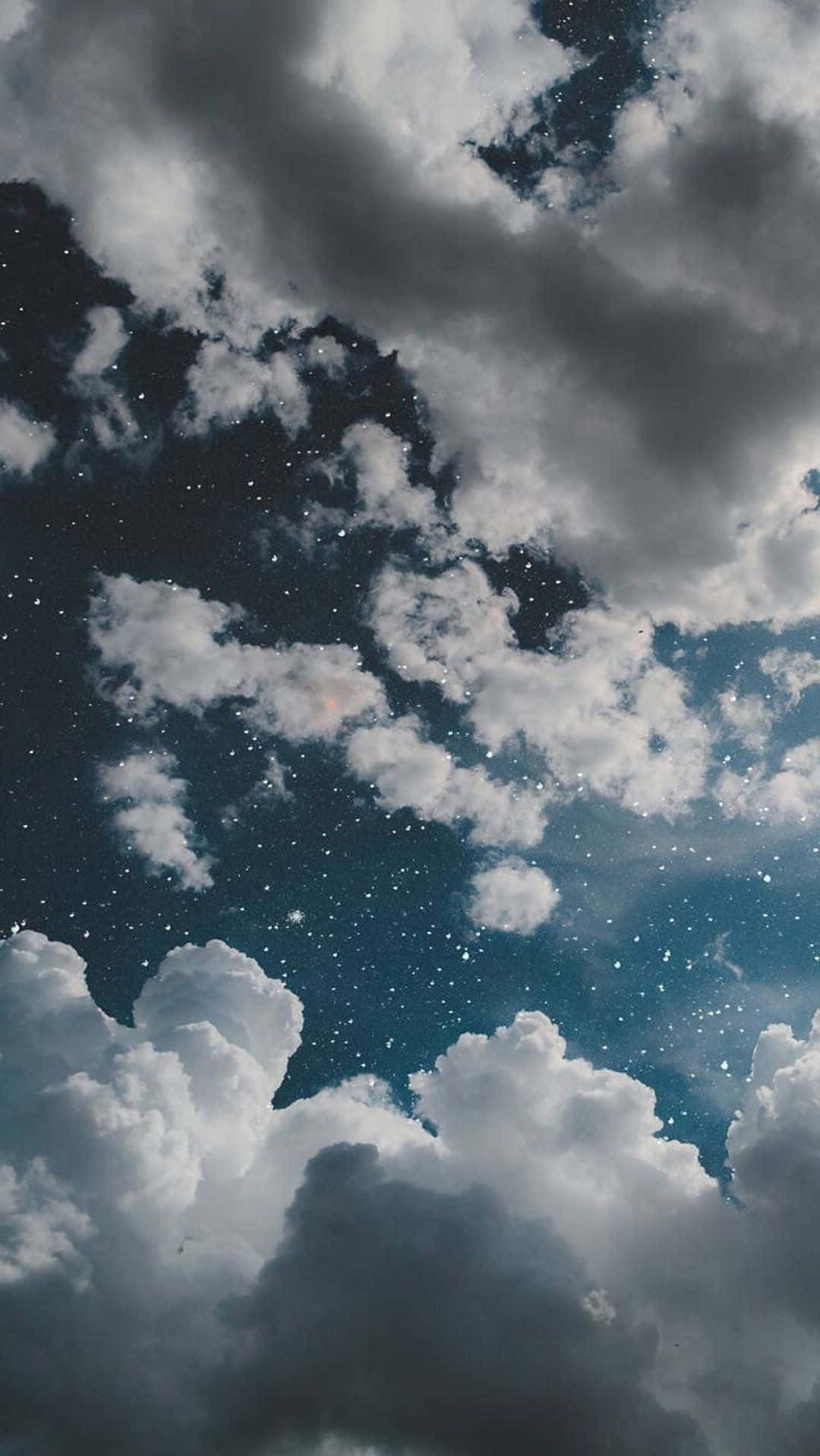 en skyet himmel med stjerner Bakgrunner