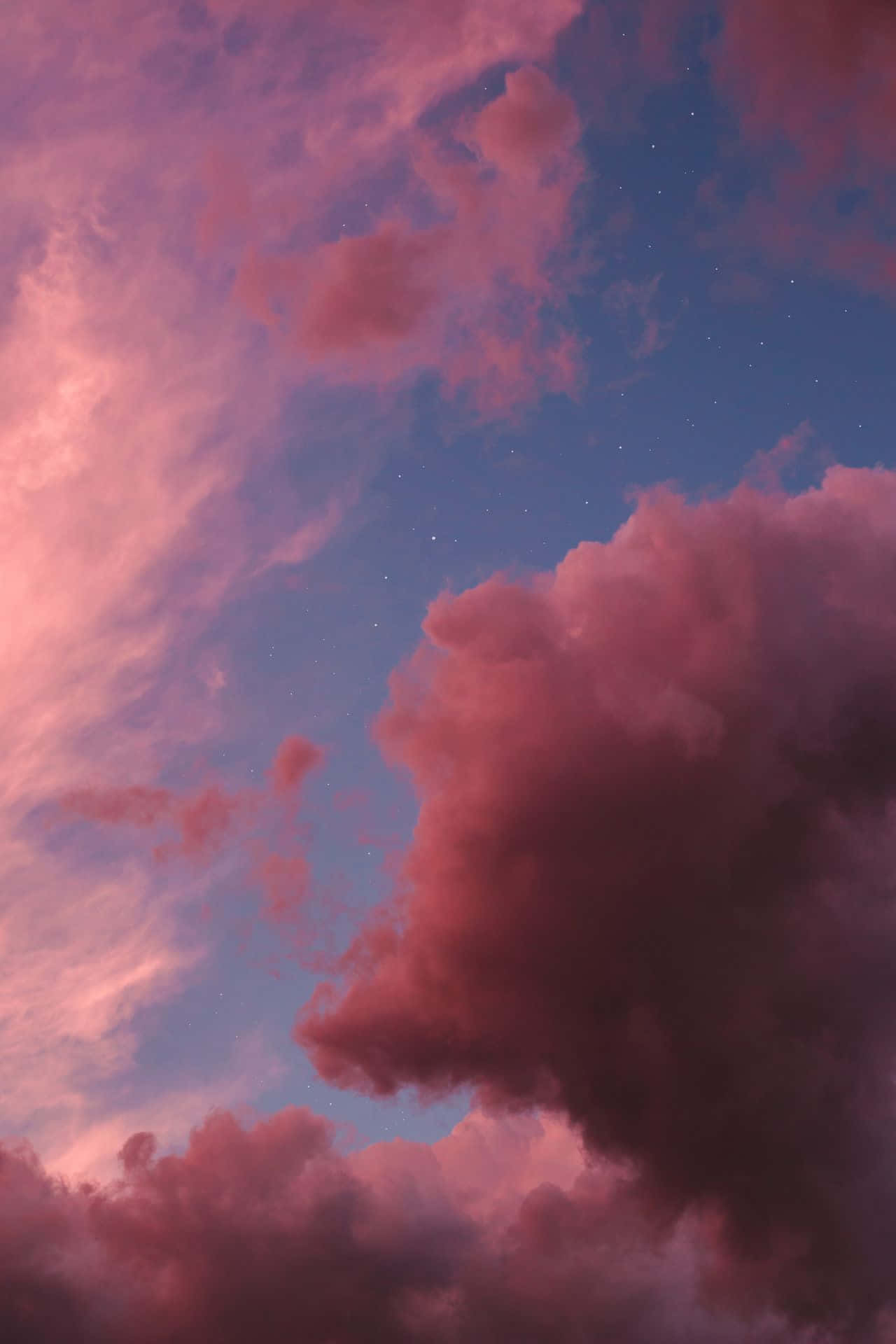 En vakker himmel med rosa og oransje nyanser Bakgrunner