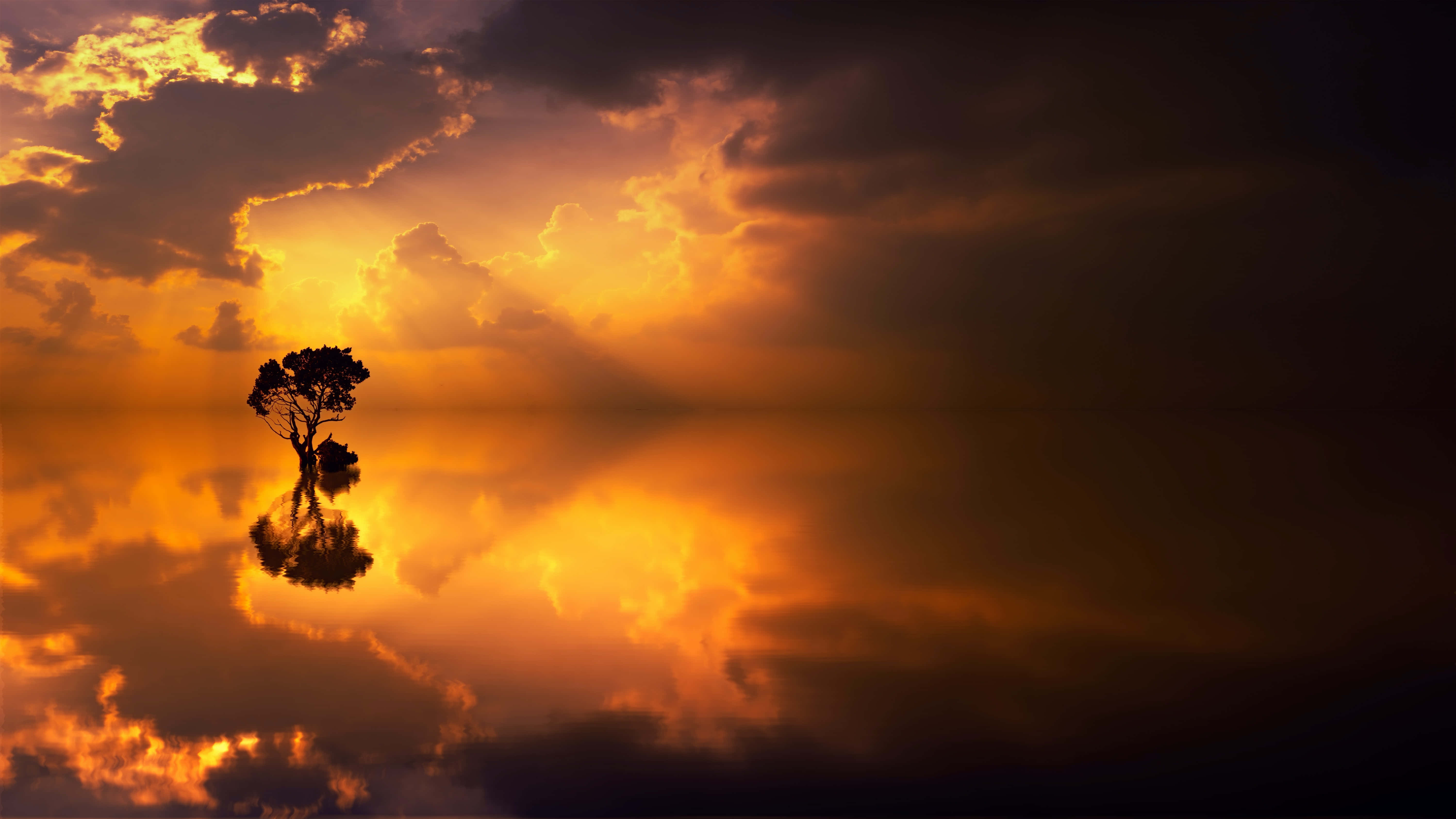 En vakker og fredelig solnedgang som speiler naturens skjønnhet Bakgrunner
