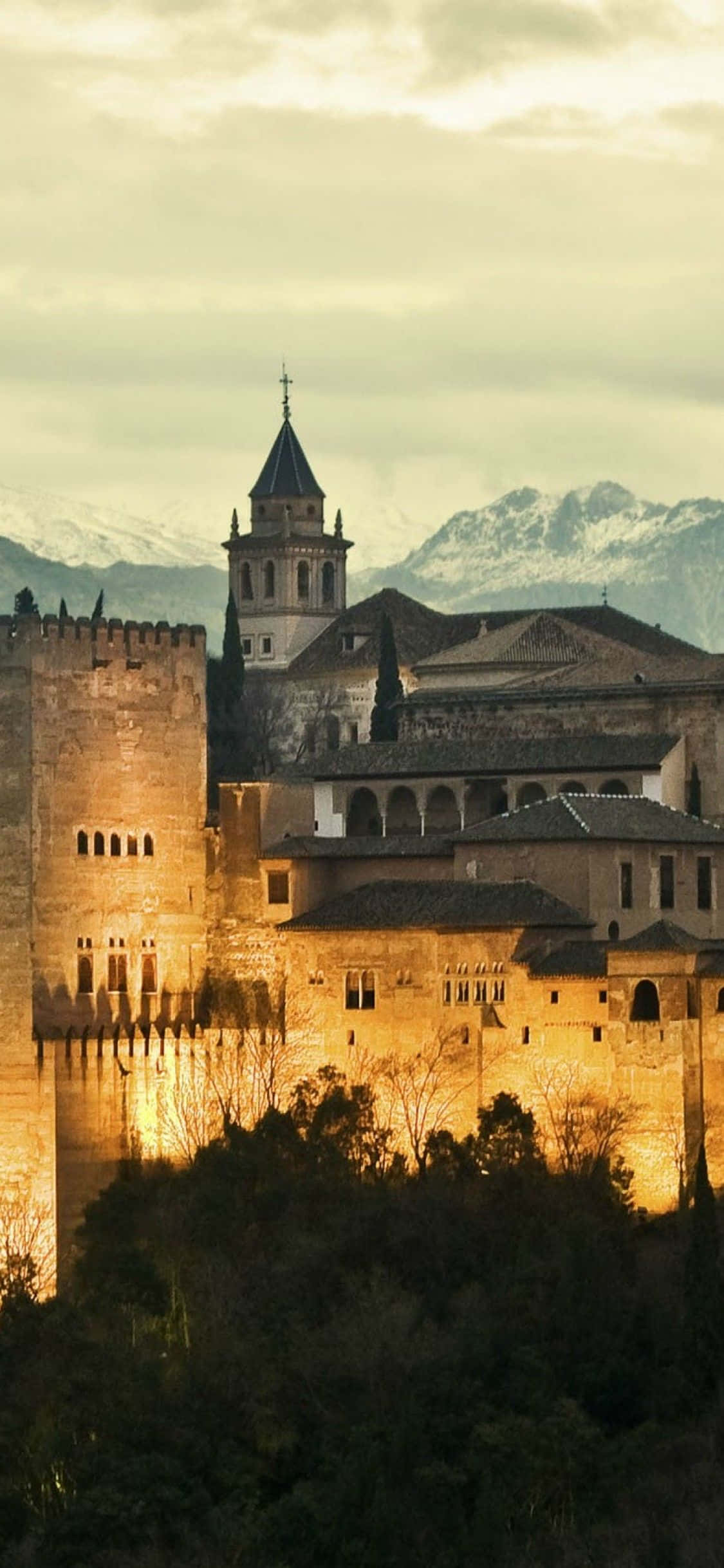 et slott er opplyst om natten i Granada Bakgrunner