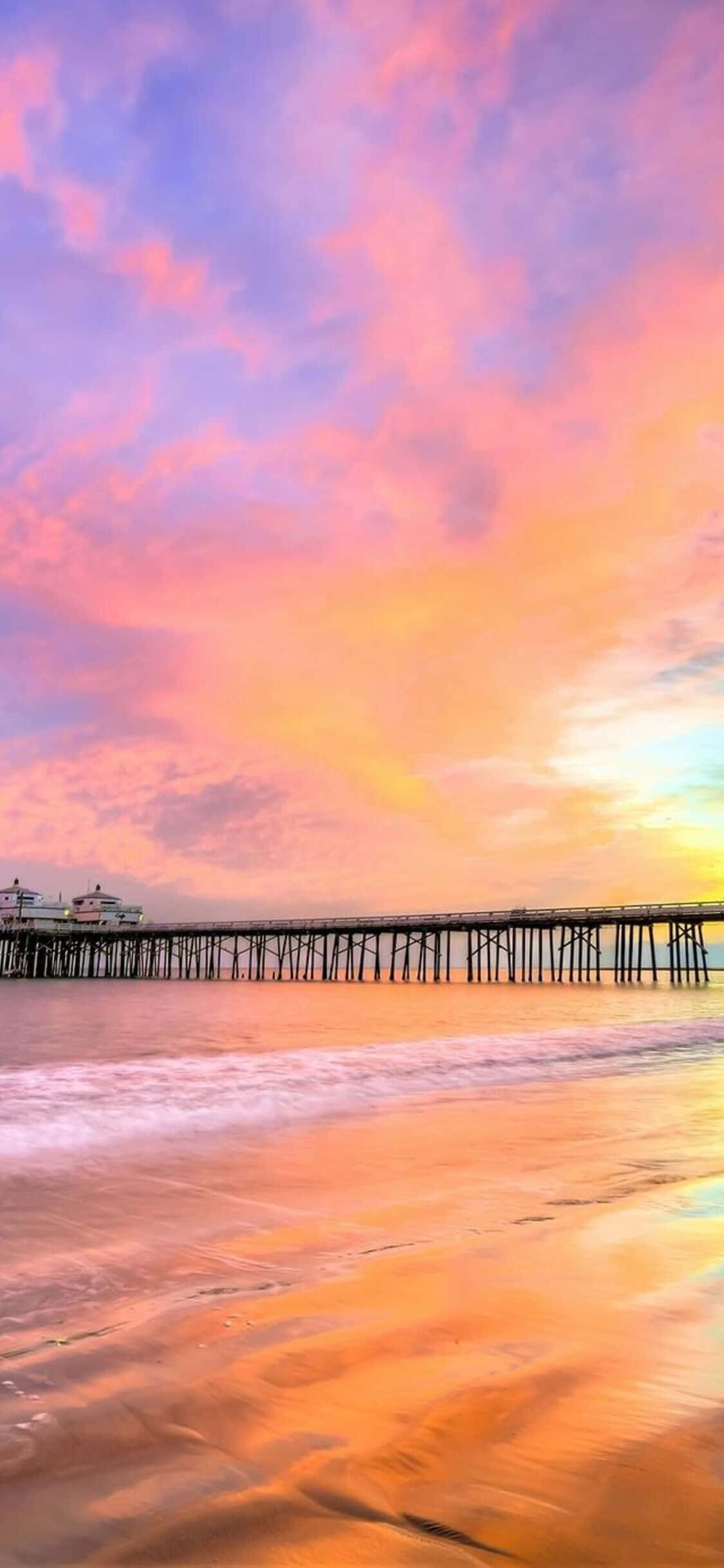 Et vakkert syn av bølgende åser og trær i California sett gjennom en iPhone X Bakgrunner