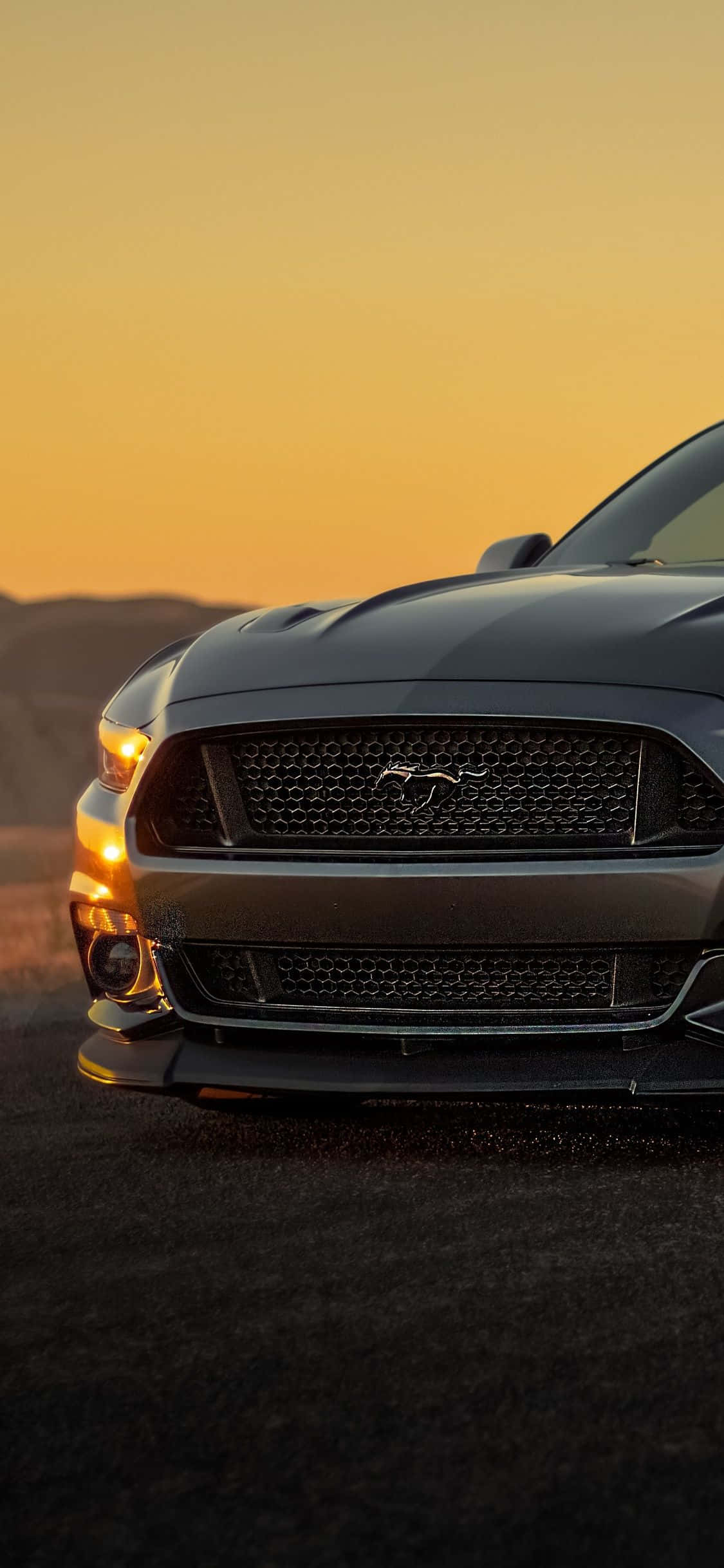 Få den nyeste Ford Mustang på telefonen din Bakgrunner
