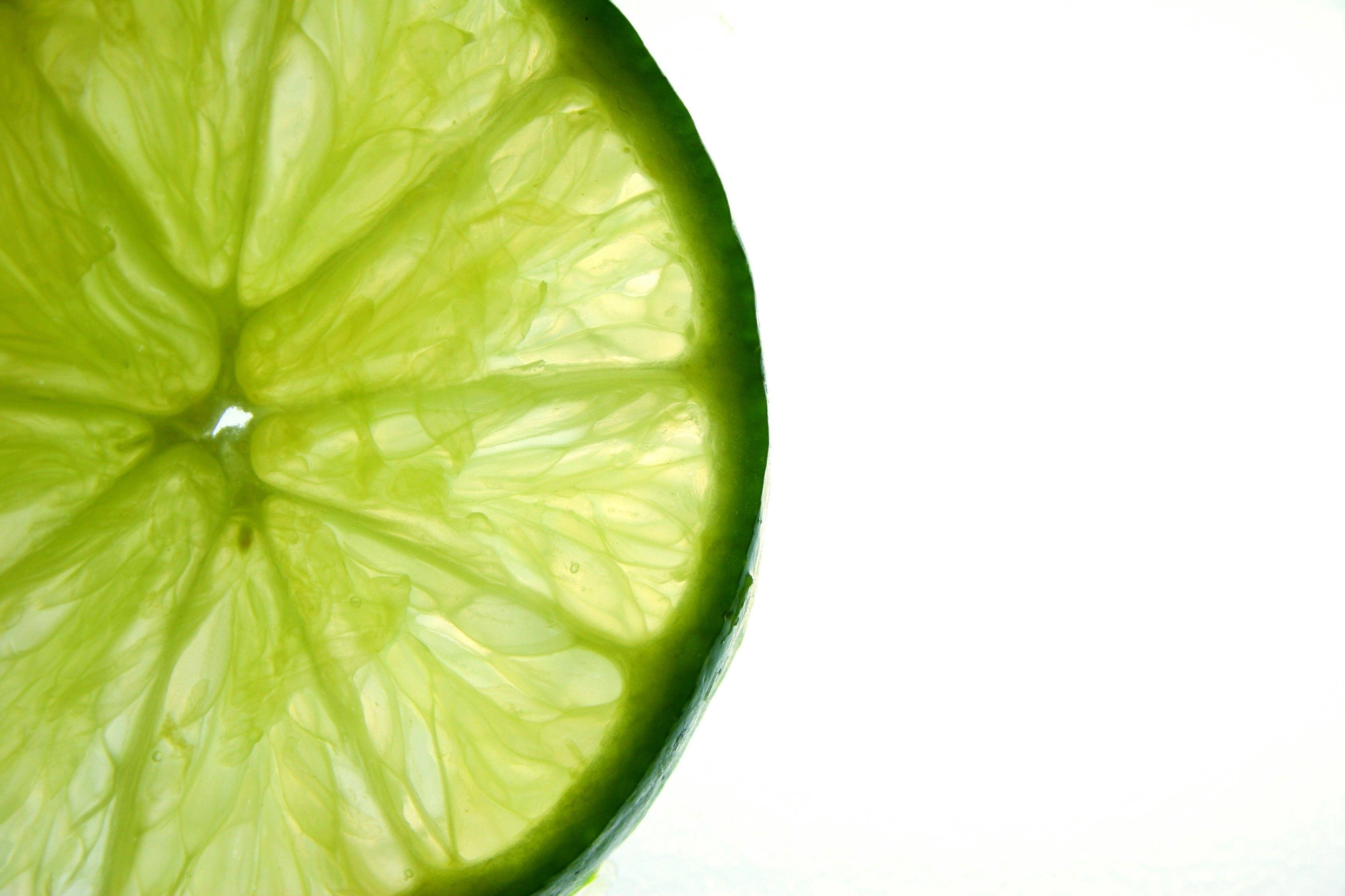 Forfriskende skive av grønn lime Bakgrunner