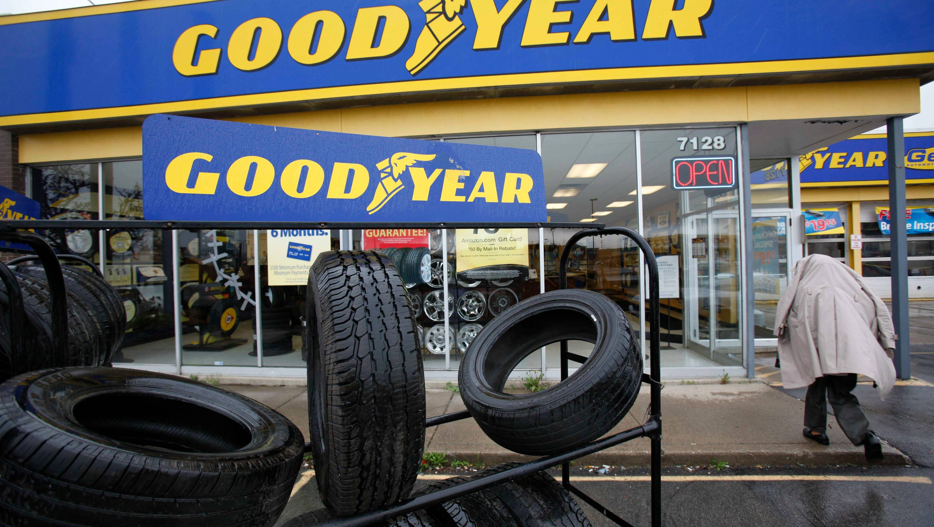 Goodyear-butikk utendørsfotografering Bakgrunner