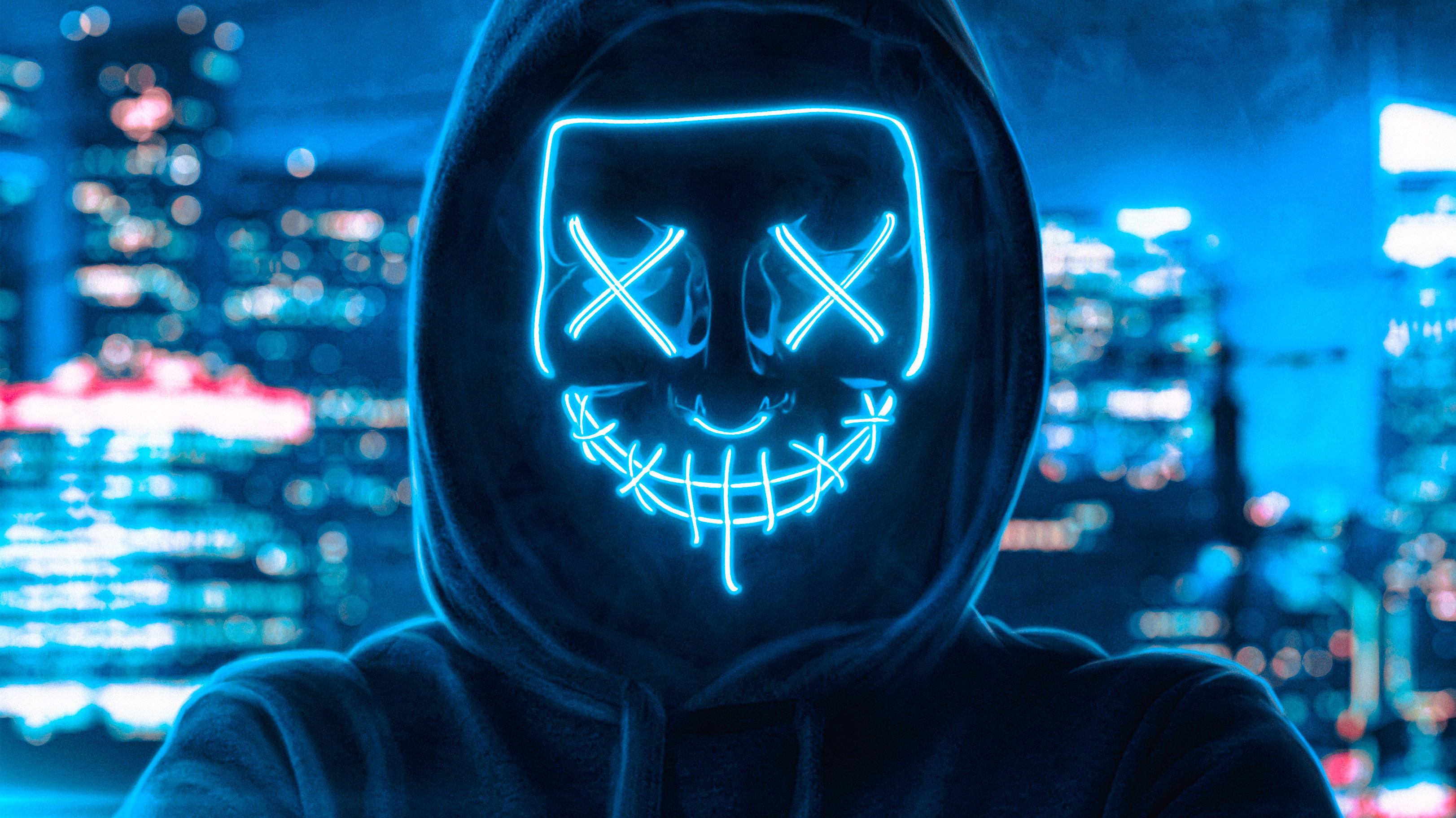 Guy i neonblått Purge-maske Bakgrunner