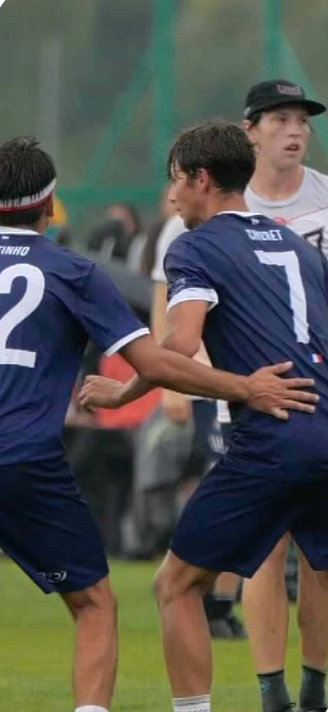 iPhone X ultimate frisbee-bakgrunn med blå uniformer Bakgrunner