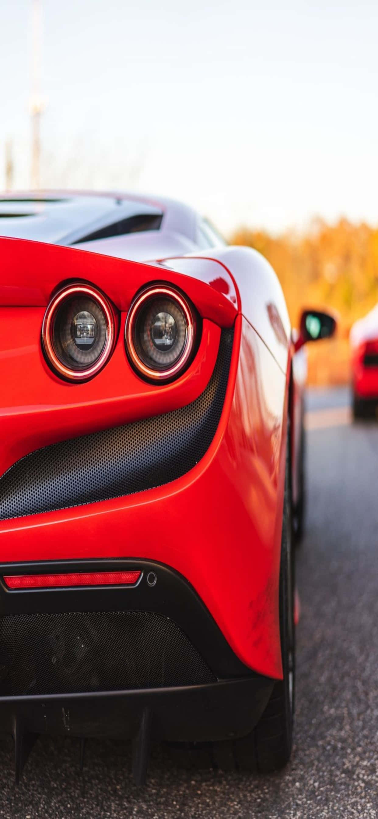 iPhone Xs Max Ferrari Bakgrunn Bakenden Av En Rød Ferrari F8 Tributo Bakgrunner