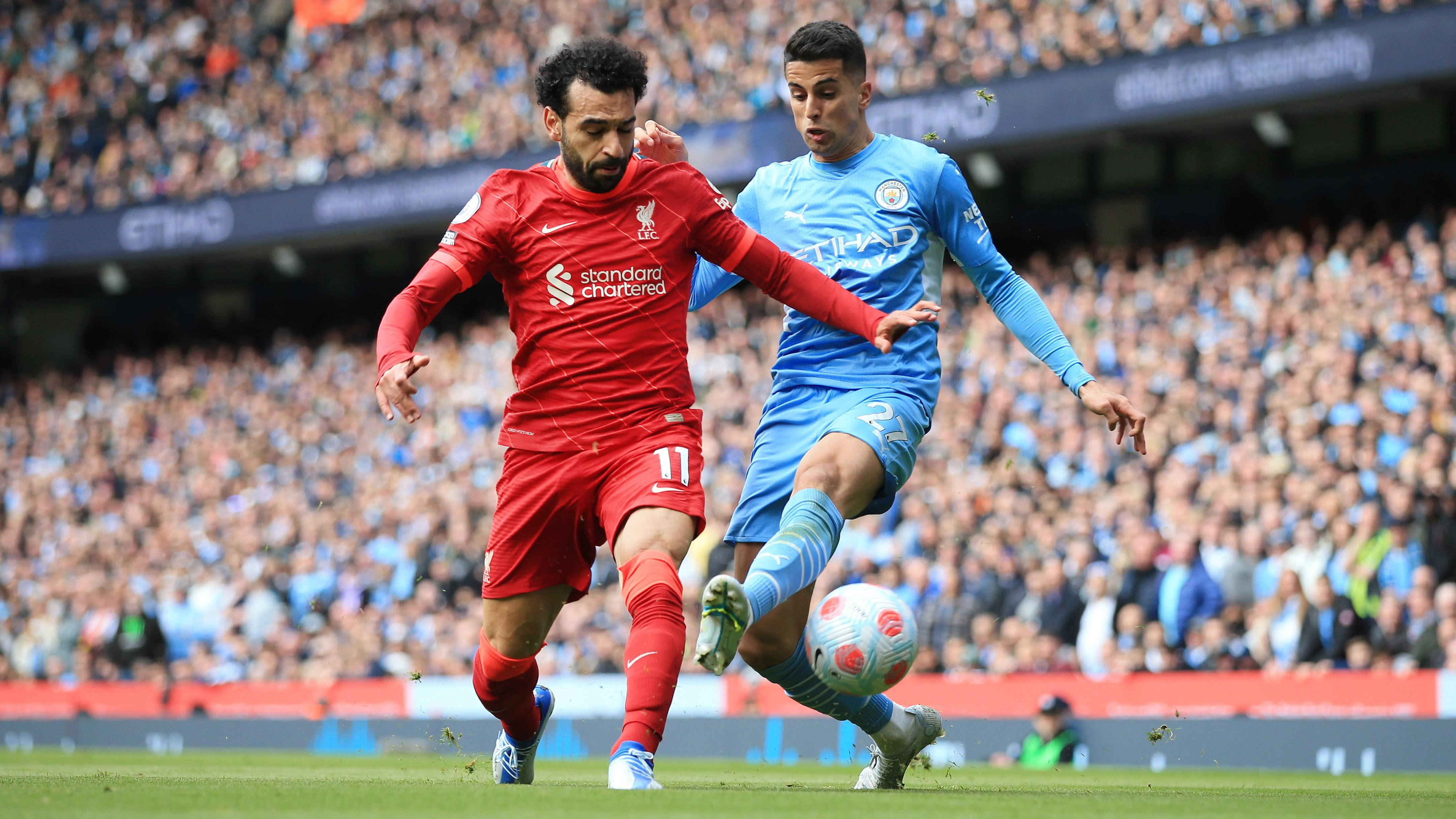 João Cancelo mot Mohamed Salah Bakgrunner