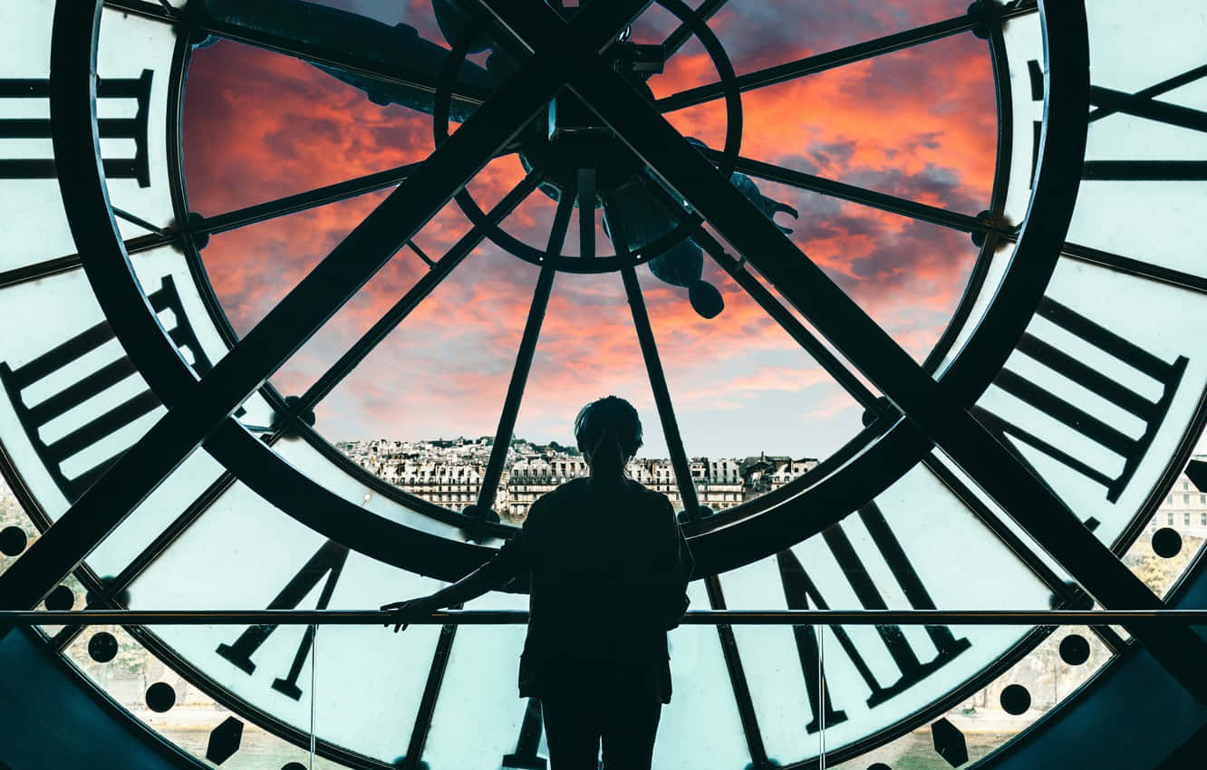 Kjempeklokke med solnedgangsutsikt på Musée d'Orsay Bakgrunner