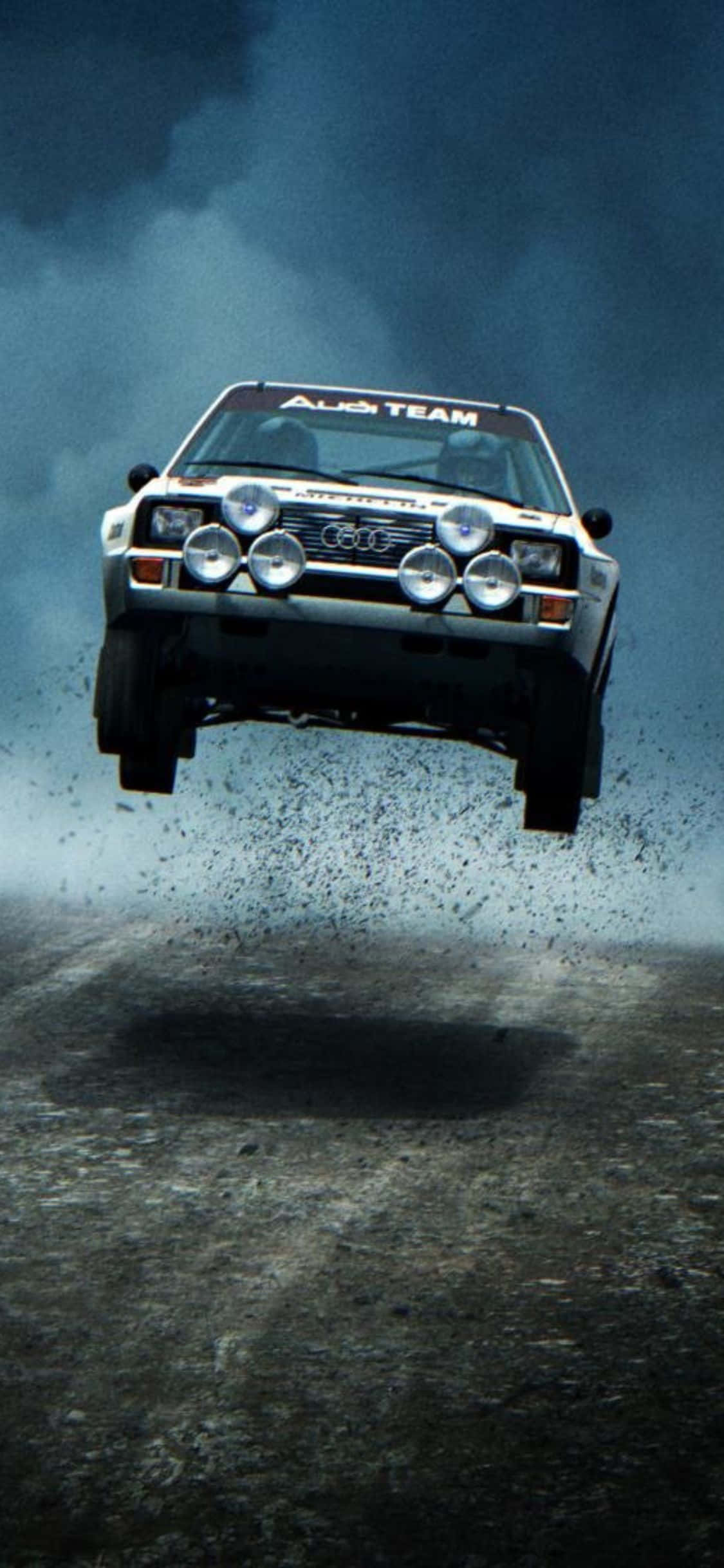 Kjenn spenningen med iPhone Xs Dirt Rally Bakgrunner