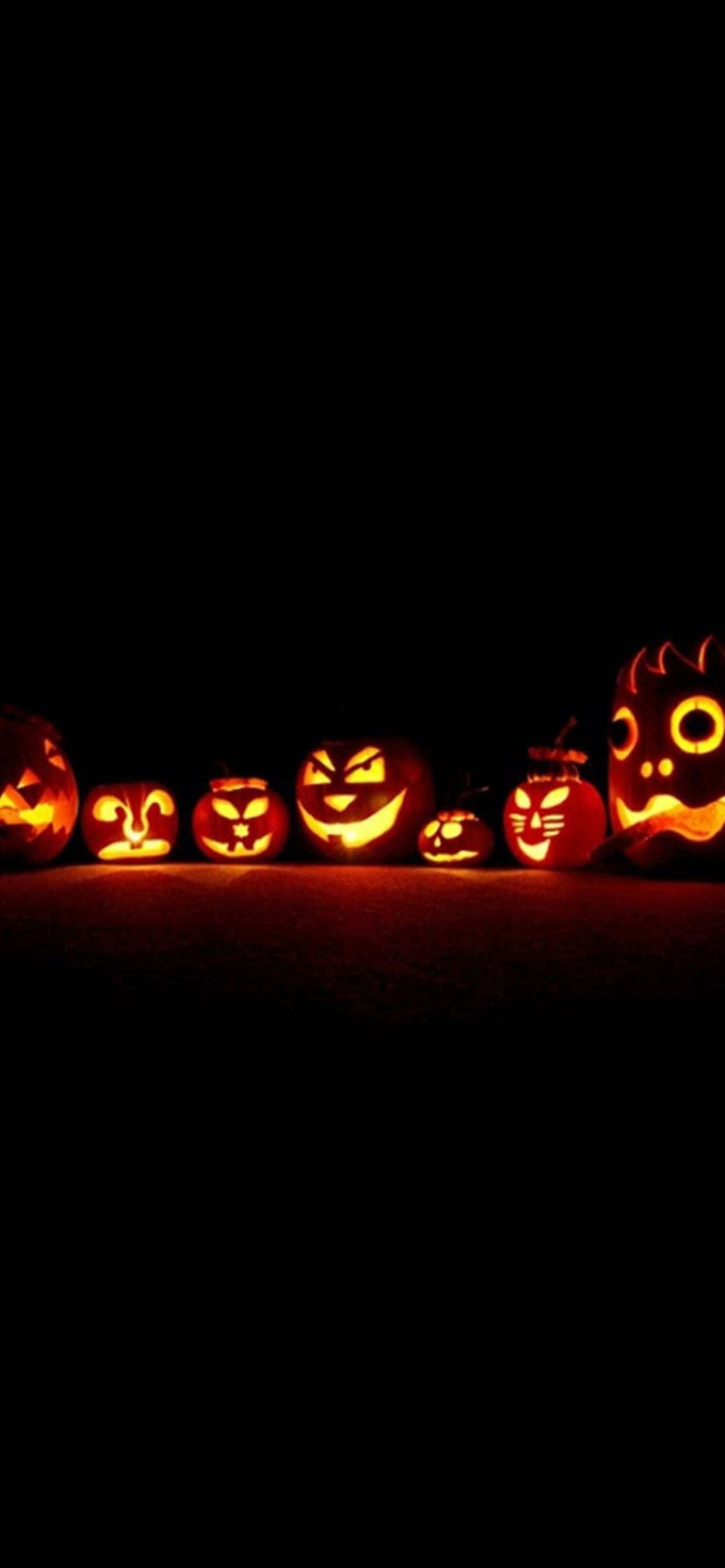 Kom i Halloween-stemning med denne iPhone-bakgrunnen Bakgrunner