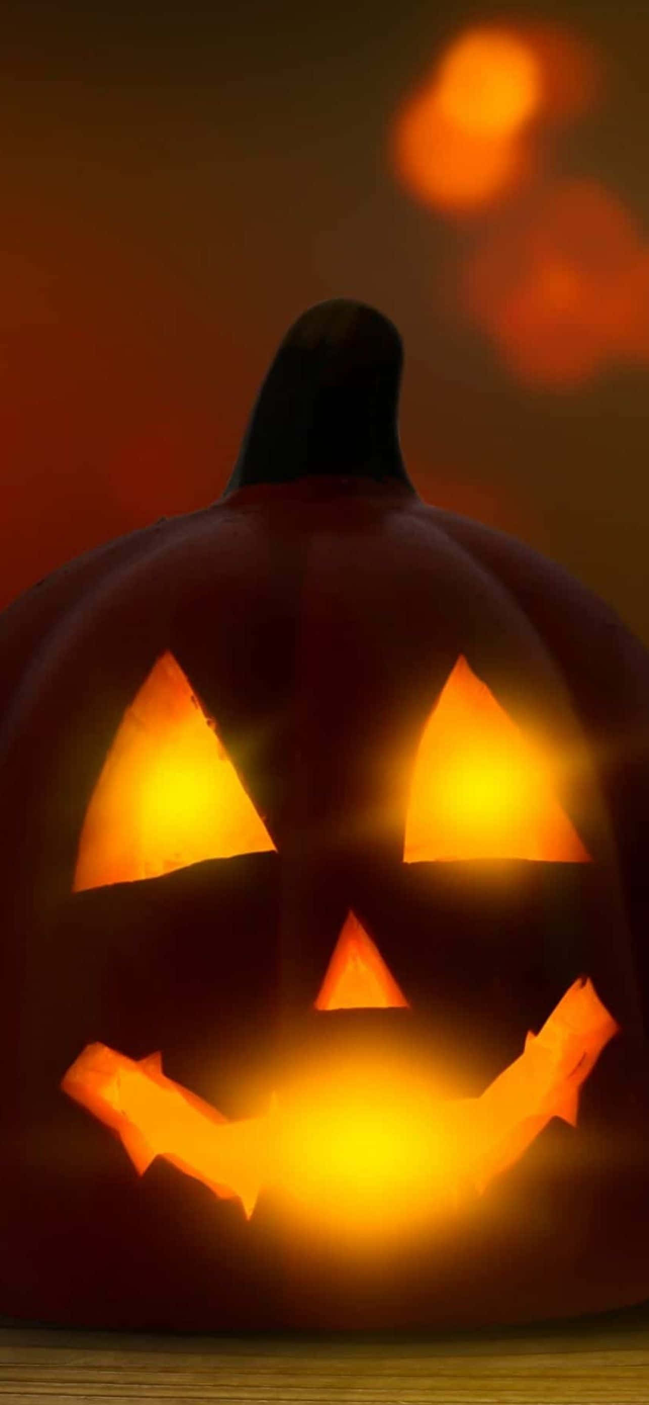Legg litt skummel moro til telefonen din med et stilrent Halloween iPhone-bakgrunnsbilde Bakgrunner