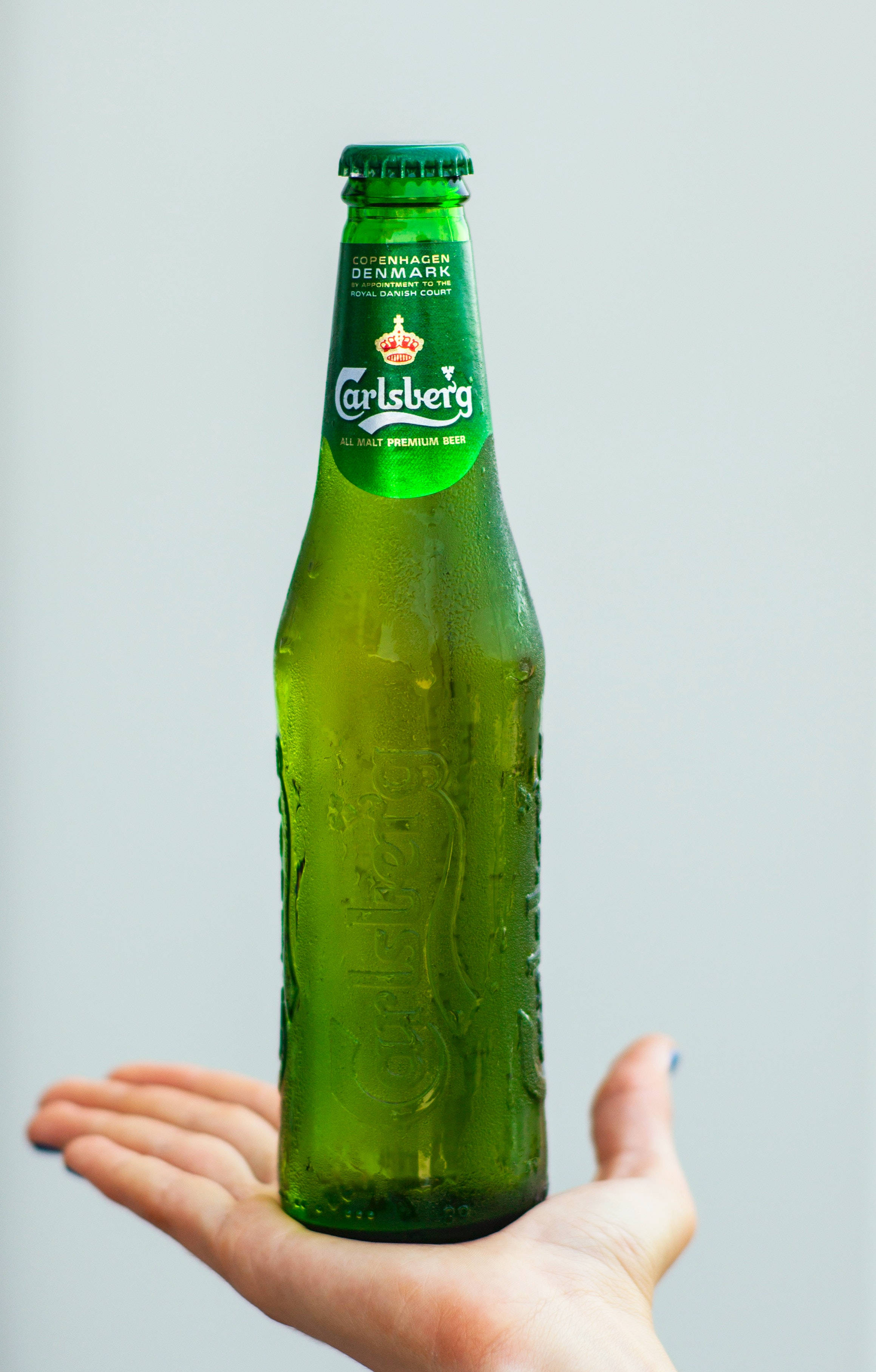 Ølflaske av Carlsberg-øl Bakgrunner