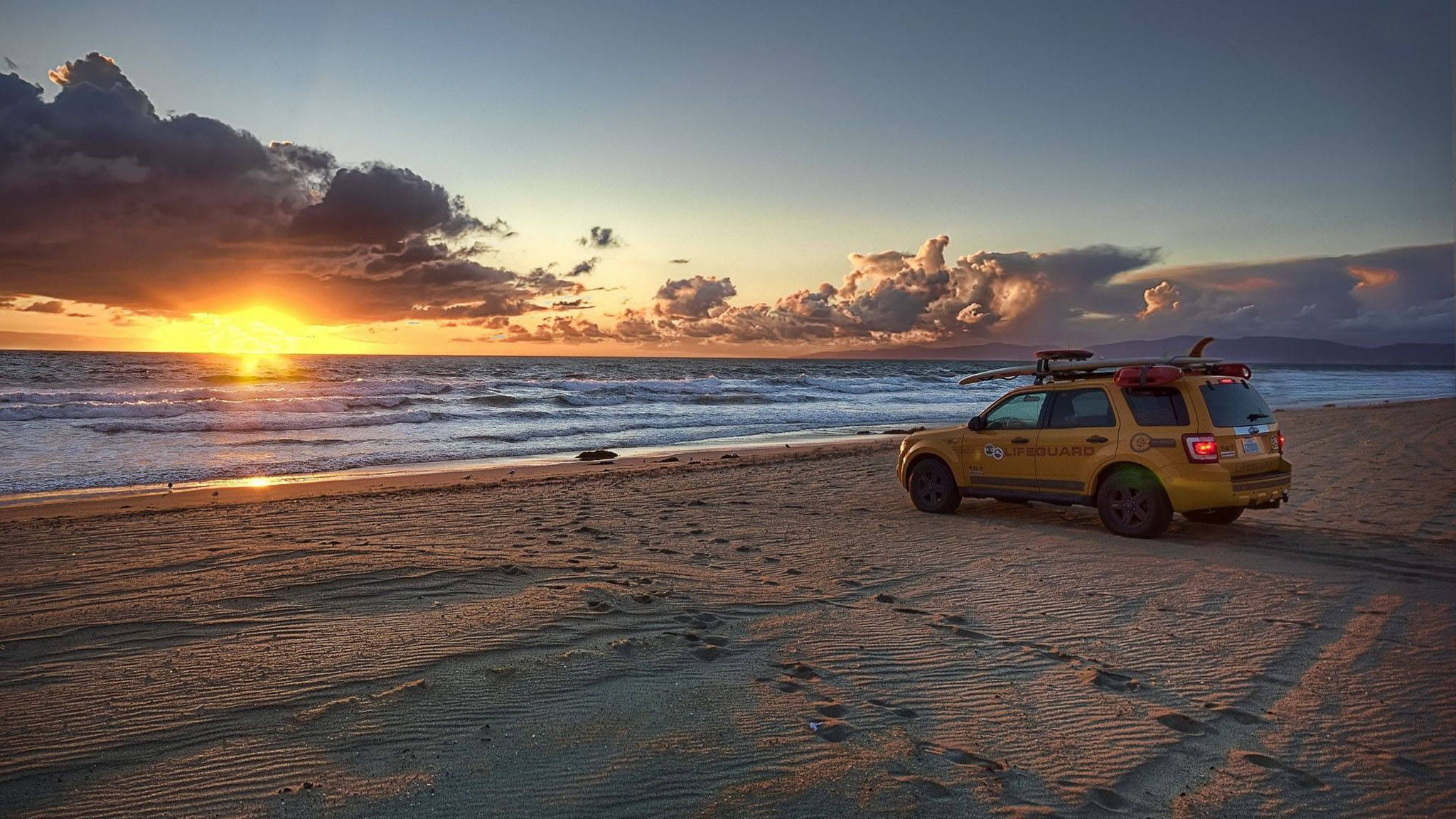 Los Angeles solnedgang ved stranden Bakgrunner