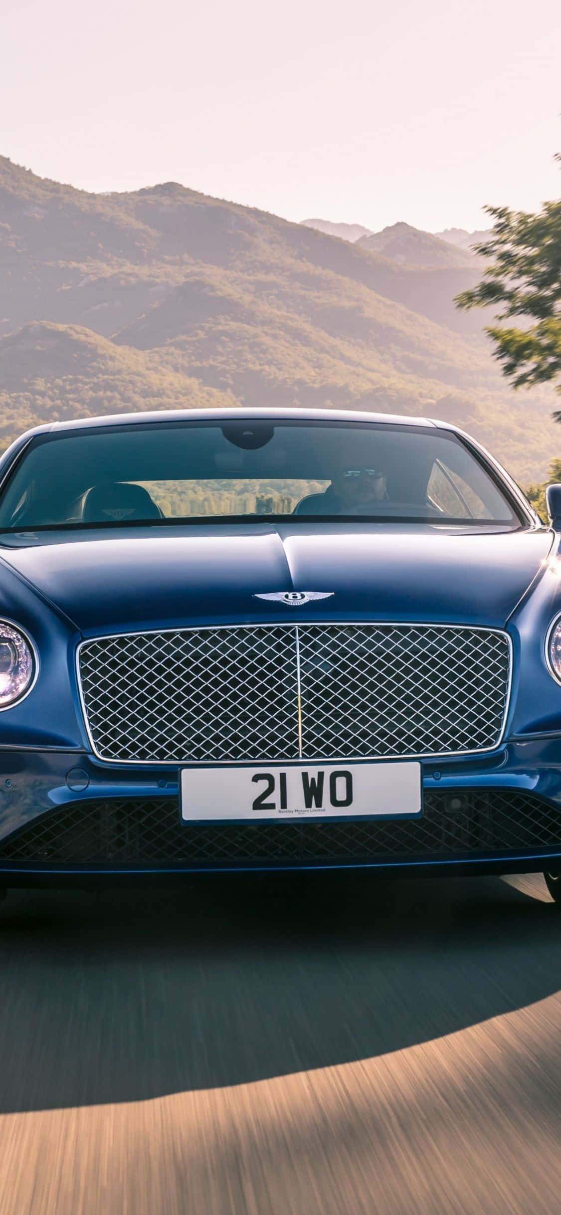 Bildetekst: Luksuriøs kjøretur i Bentley med iPhone Bakgrunner