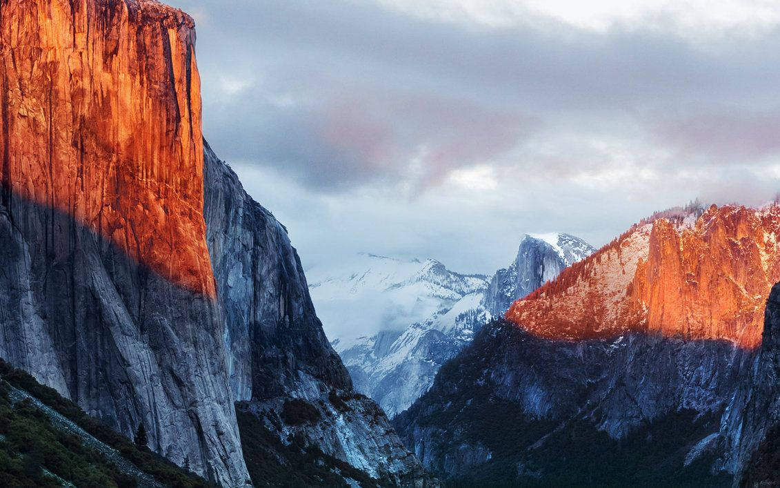 Majestetisk Yosemite-fjell sett fra en MacBook Pro Bakgrunner