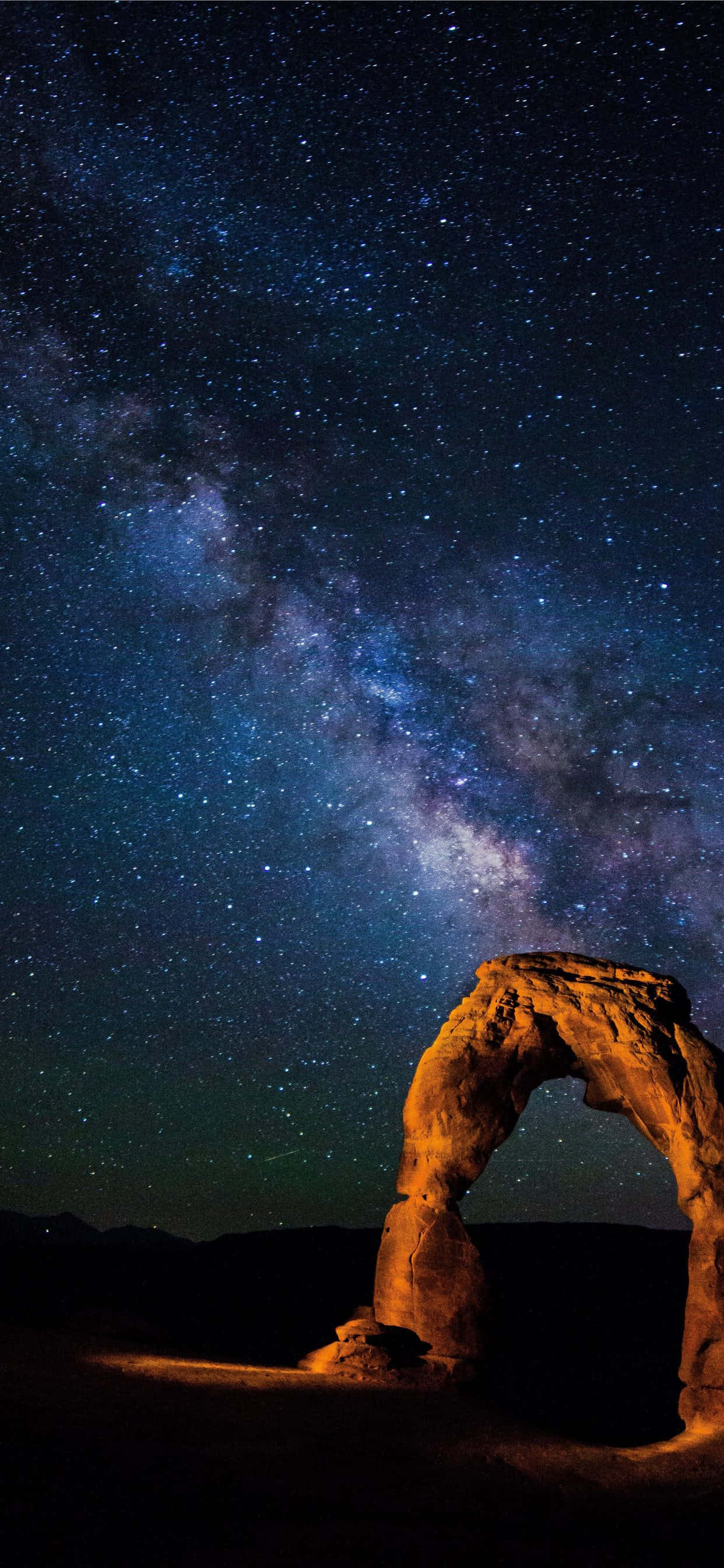 Melkeveien over Delicate Arch Bakgrunner