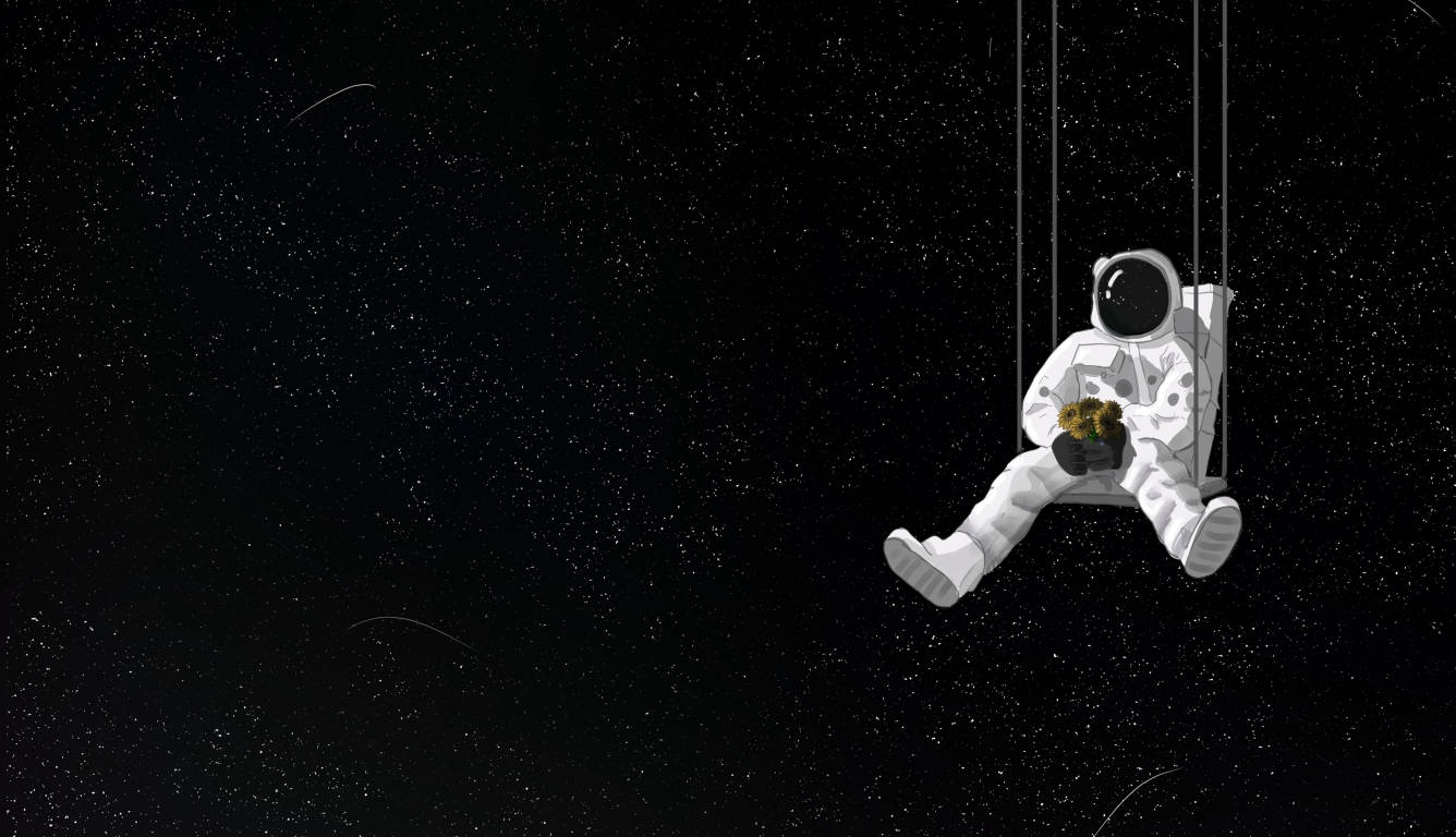 Mørk bærbar med hengende astronaut