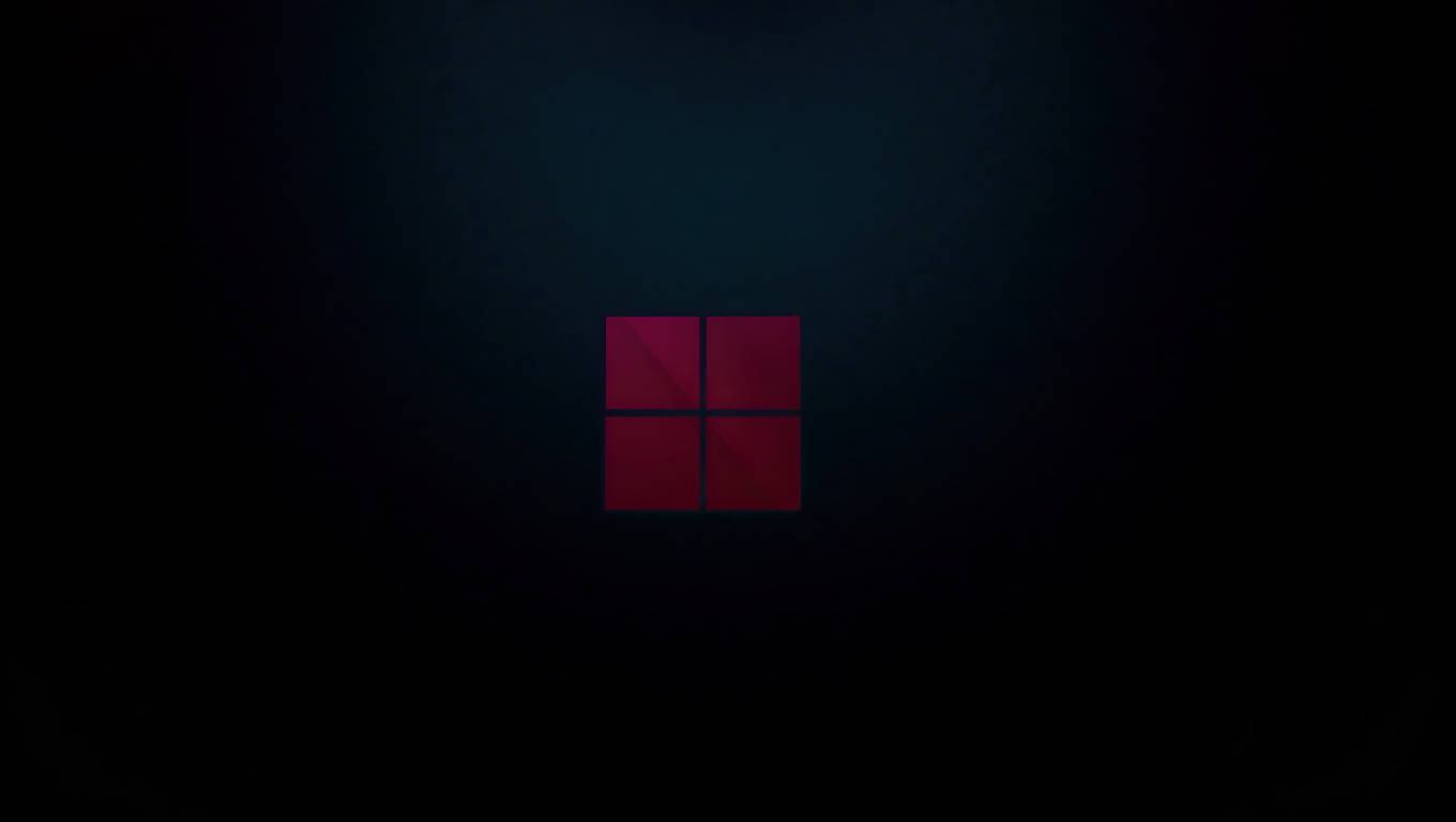 Mørk laptop med Windows 11-logo Bakgrunner