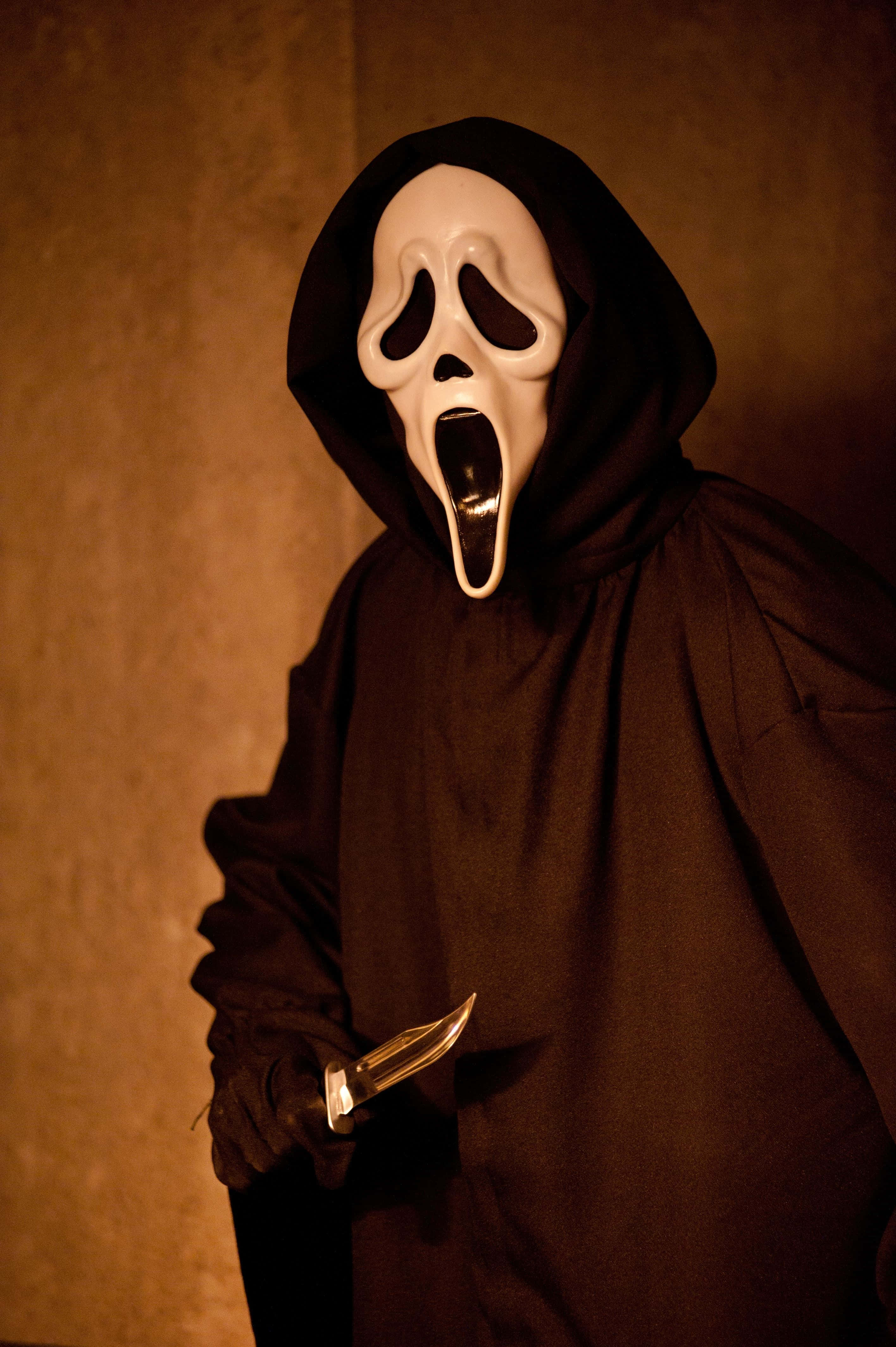 Mystisk Ghostface i skyggene Bakgrunner