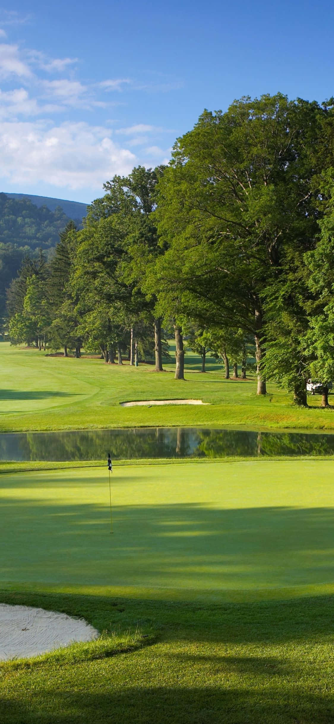 Nyt de spektakulære utsiktene på golfbanen med min iPhone X Bakgrunner